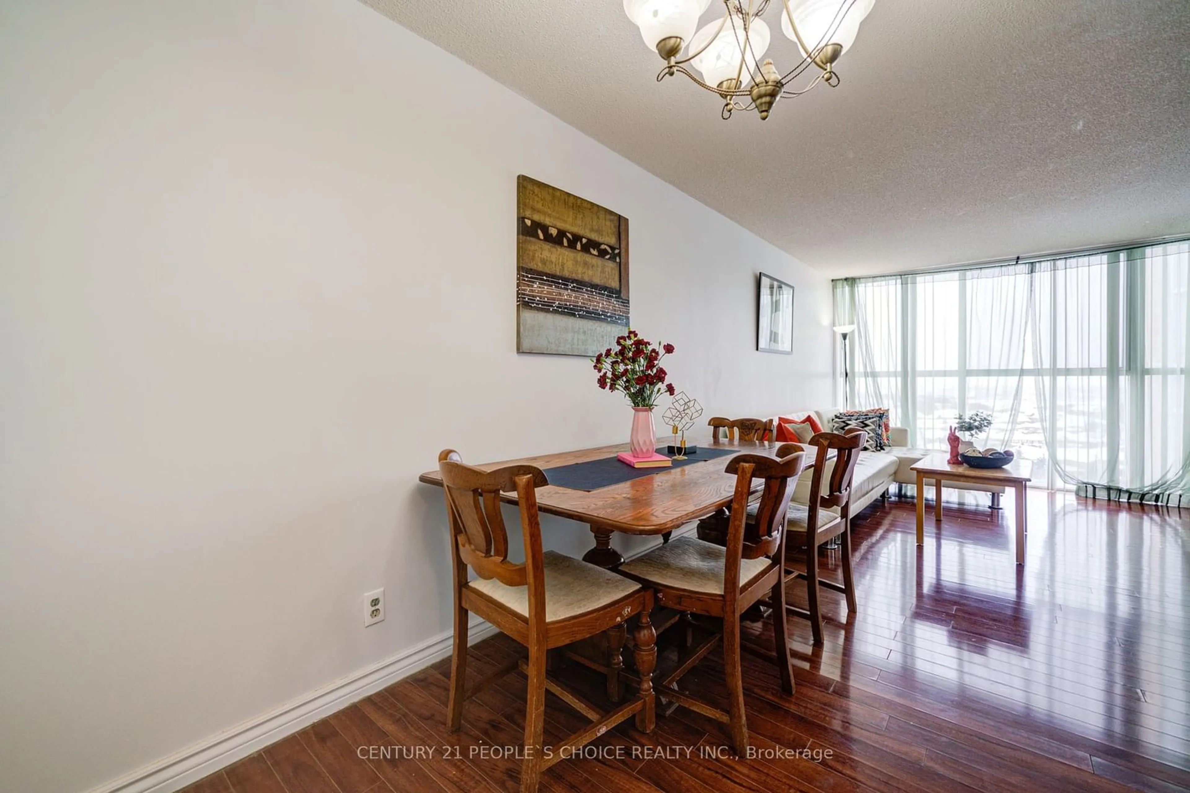 Dining room, wood/laminate floor for 25 Trailwood Dr #1206, Mississauga Ontario L4Z 3K9