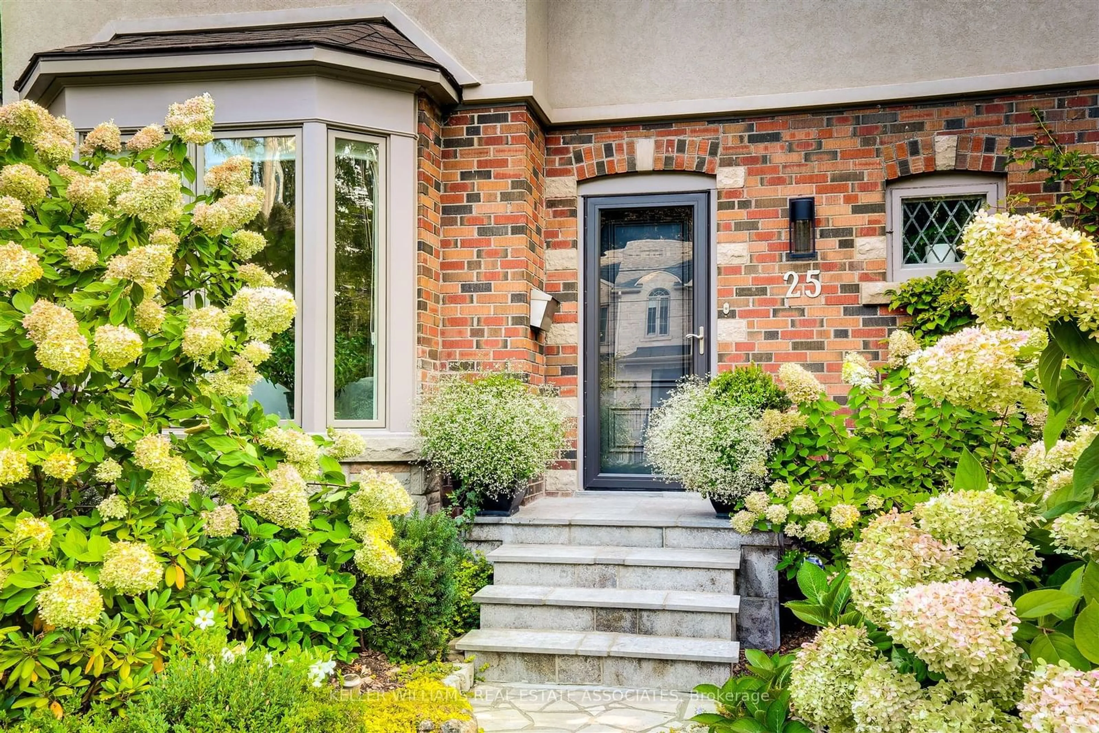 Home with brick exterior material, street for 25 Wesley Ave, Mississauga Ontario L5H 2M6