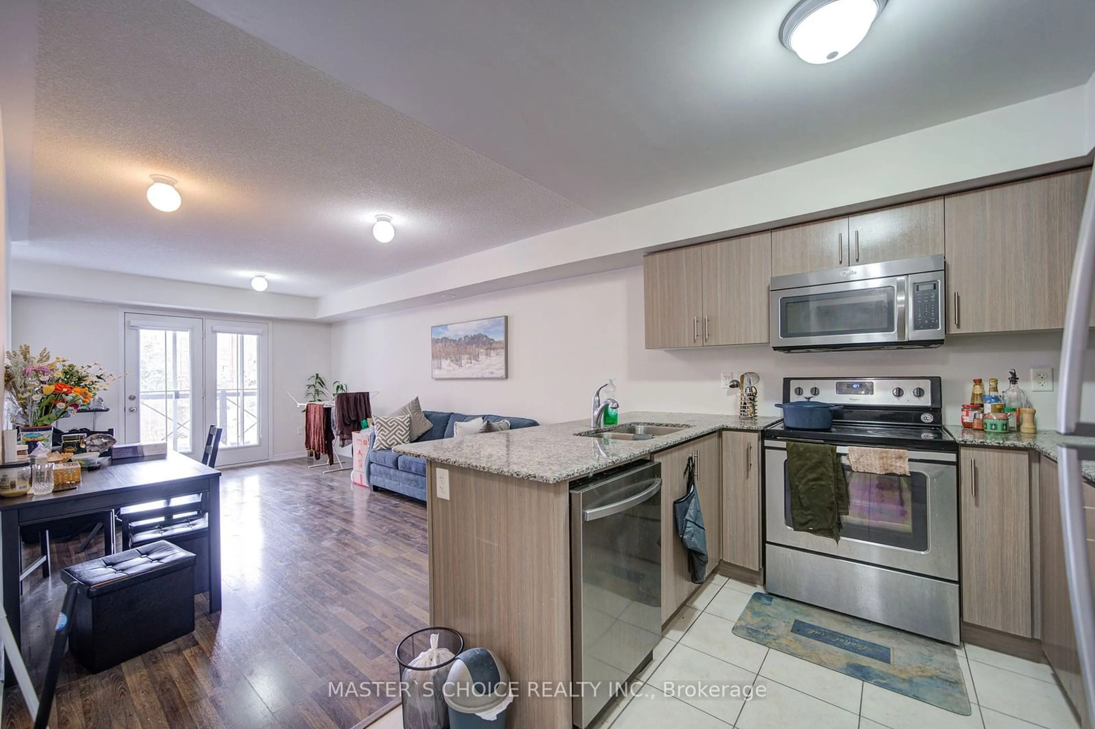 Open concept kitchen, unknown for 2500 Post Rd #14, Oakville Ontario L6H 0K1