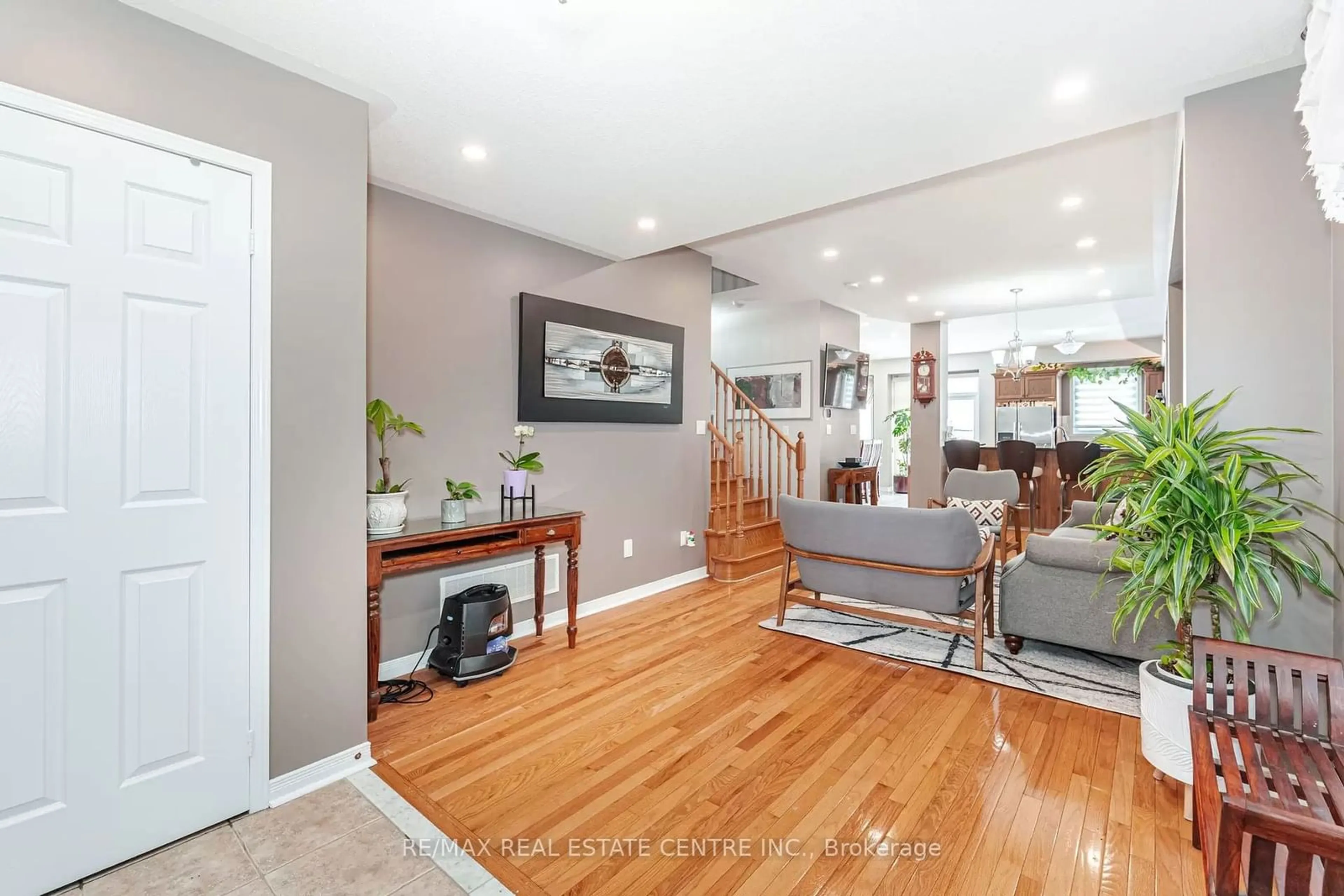 Living room with furniture, wood/laminate floor for 25 Leila Jackson Terr, Toronto Ontario M3L 0B2