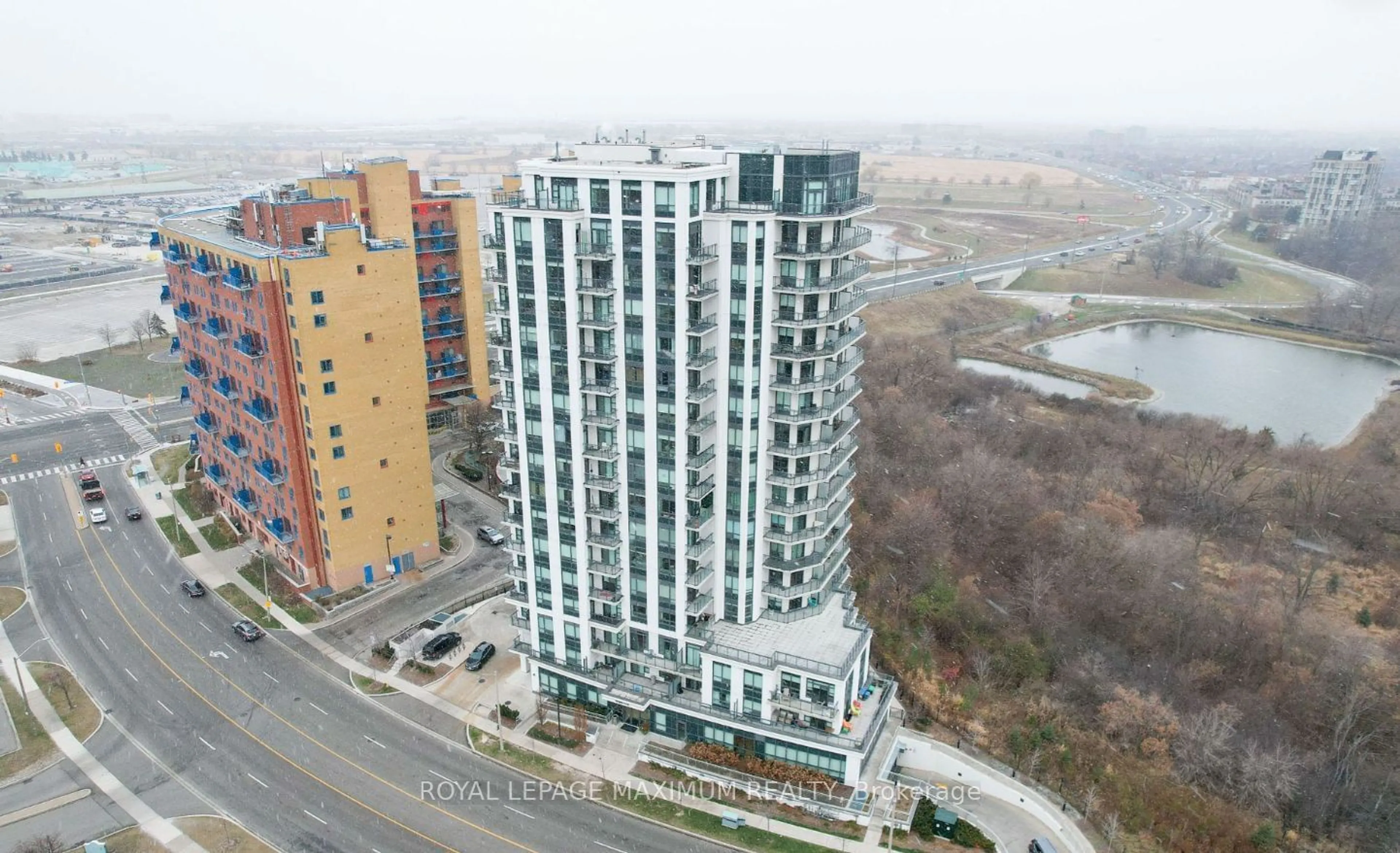 A pic from outside/outdoor area/front of a property/back of a property/a pic from drone, city buildings view from balcony for 840 Queens Plate Dr #1503, Toronto Ontario M9W 0E7