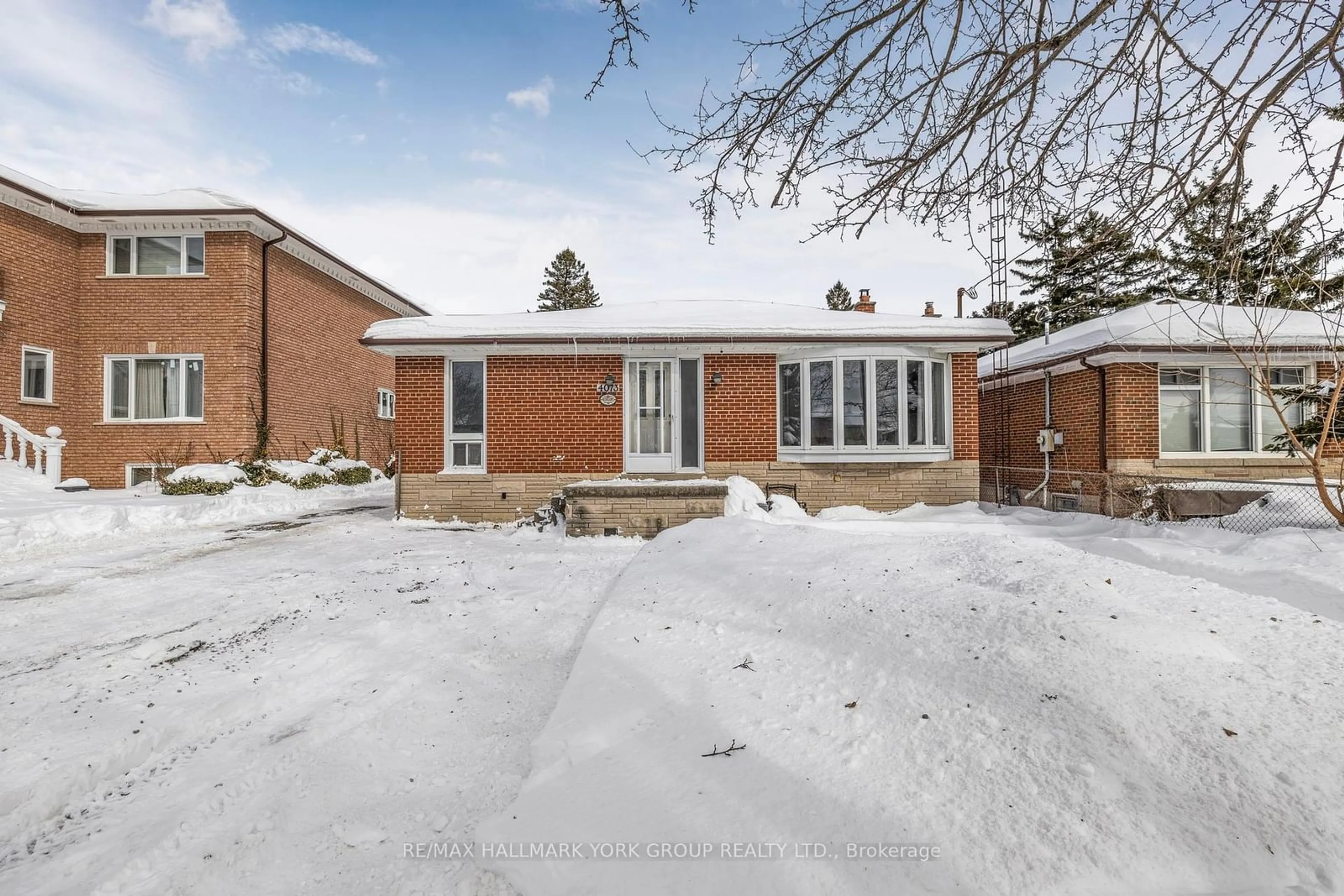 Home with brick exterior material, street for 4073 Tomken Rd, Mississauga Ontario L4W 1J4