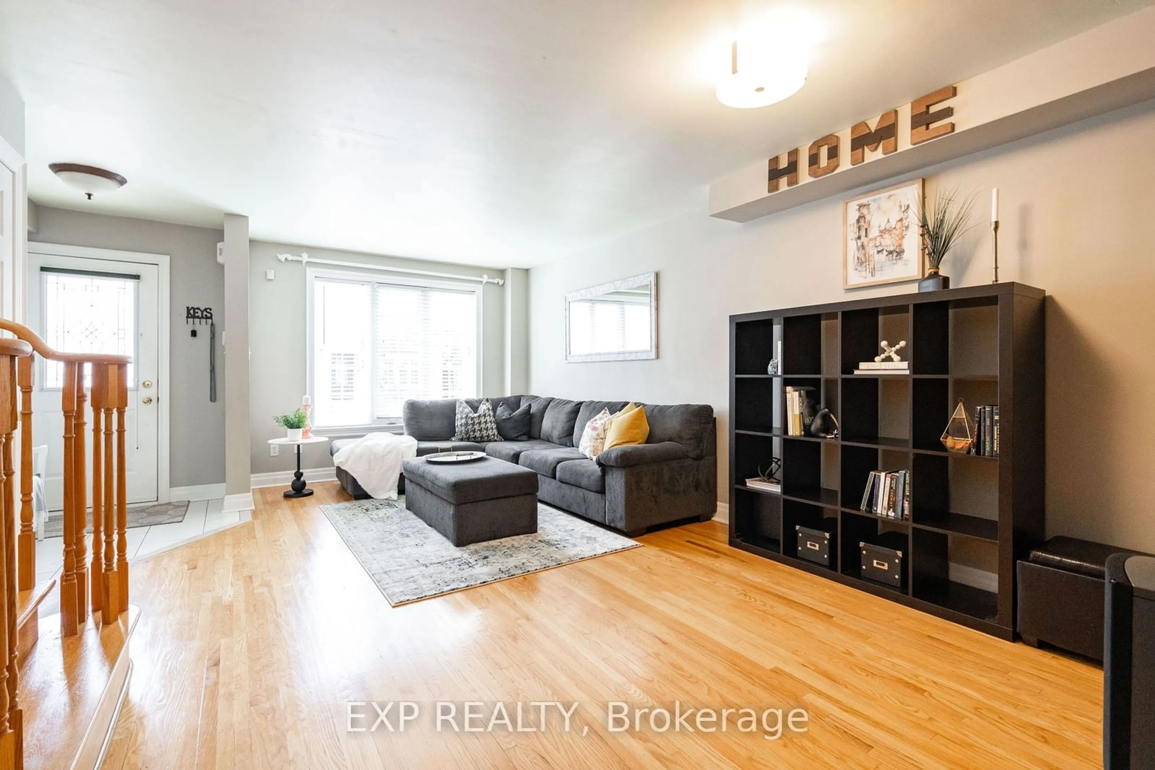 Living room with furniture, wood/laminate floor for 18 Estoril Terr, Toronto Ontario M6N 5E2