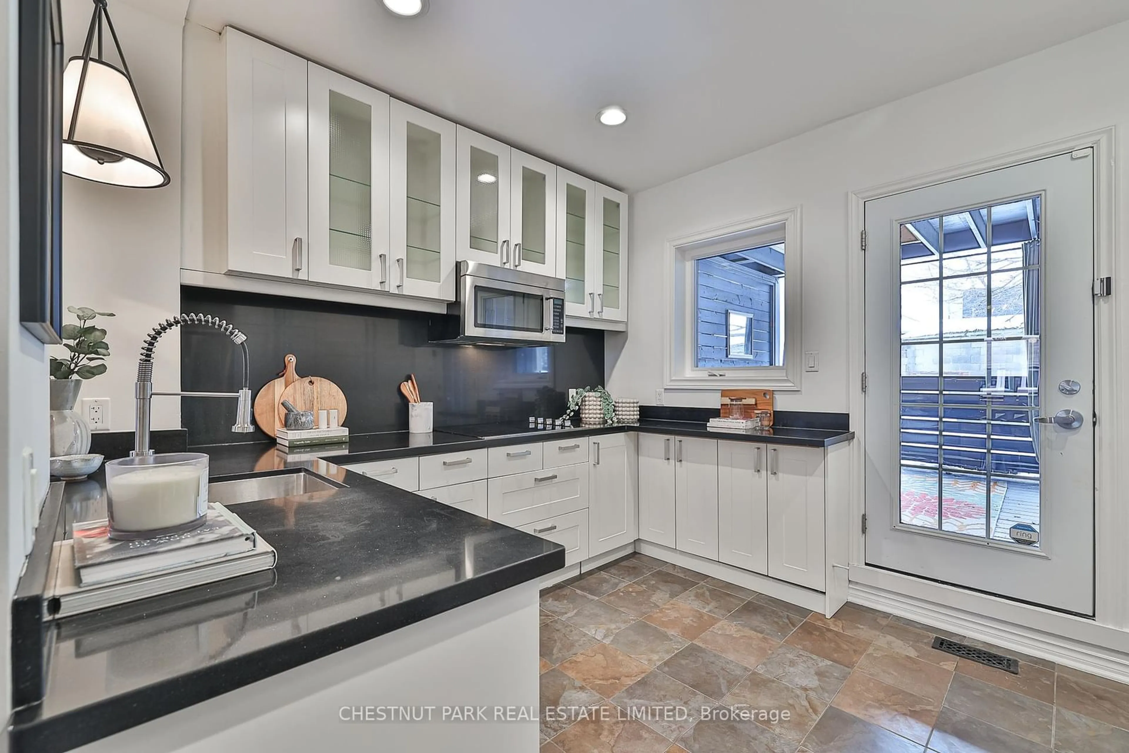 Open concept kitchen, ceramic/tile floor for 150 Christie St, Toronto Ontario M6G 3B4