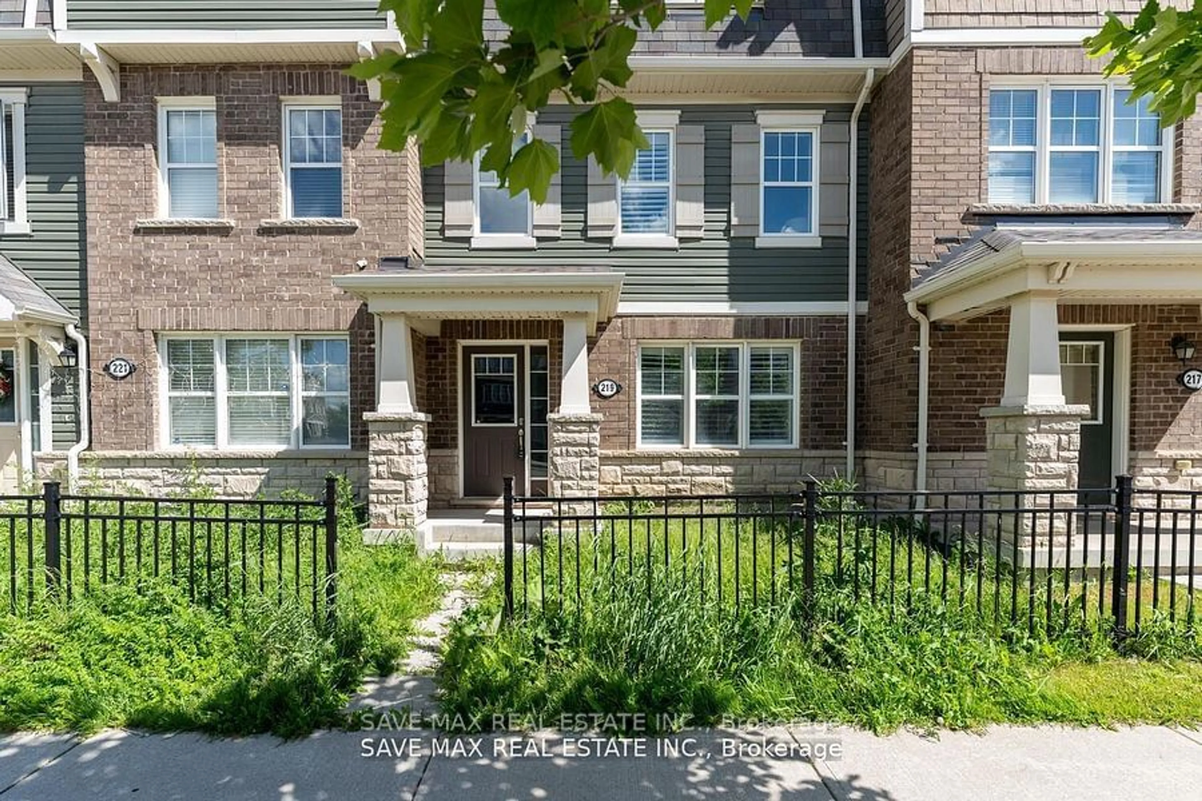 Home with brick exterior material, street for 219 Remembrance Rd, Brampton Ontario L7A 4J9