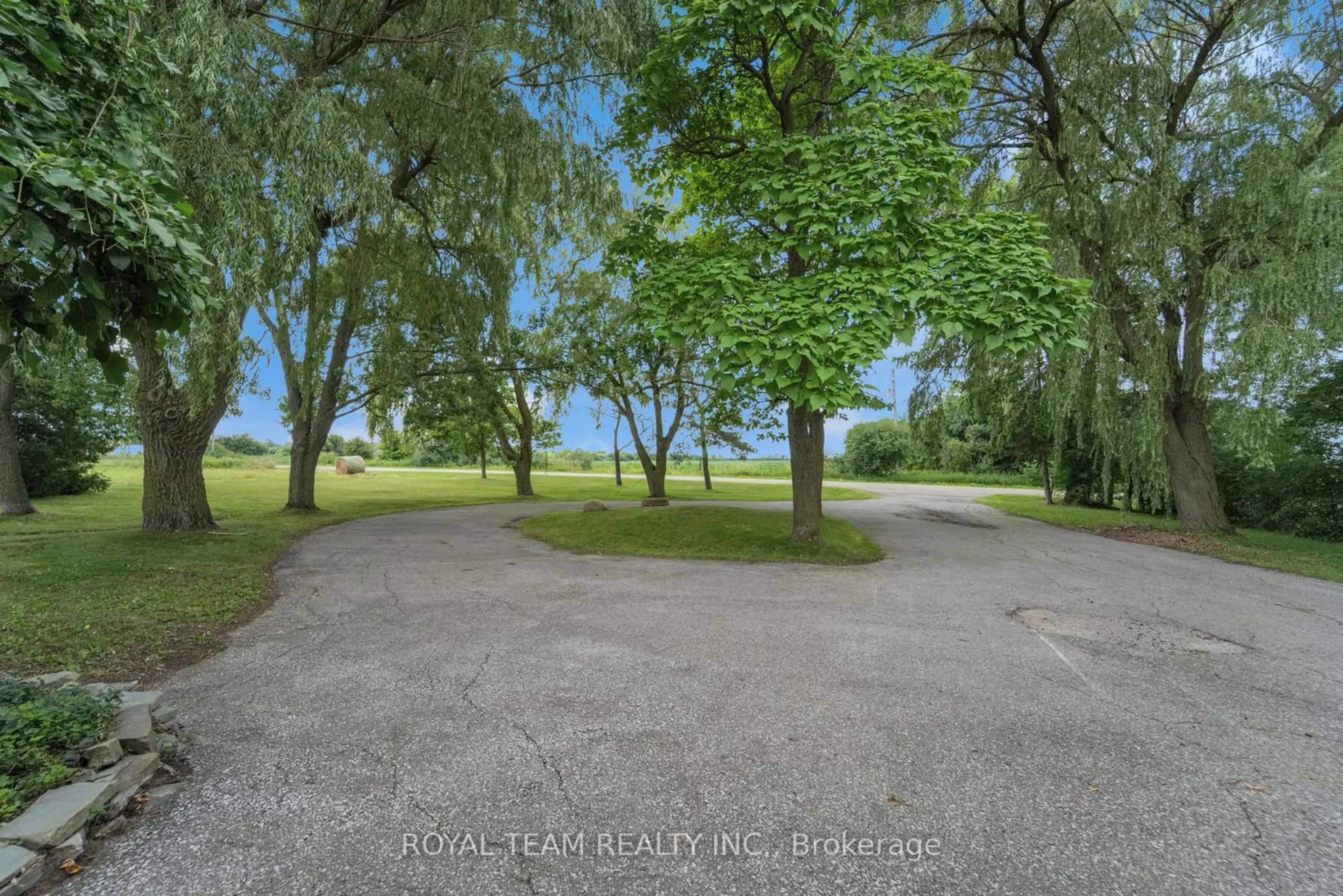 A pic from outside/outdoor area/front of a property/back of a property/a pic from drone, water/lake/river/ocean view for 13595 Centreville Creek Rd, Caledon Ontario L7C 3B9