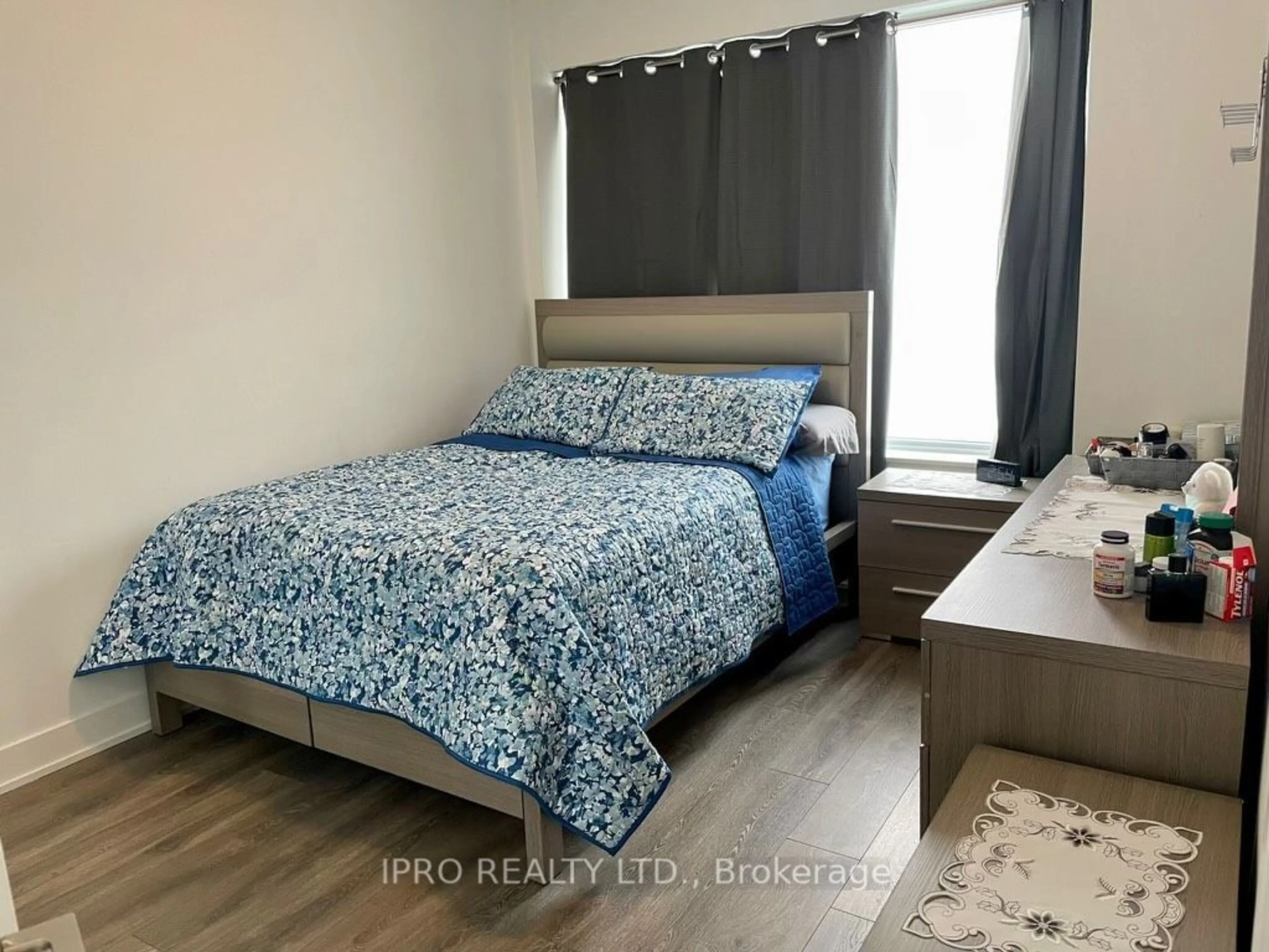 Bedroom with bed, wood/laminate floor for 297 oak walk Dr #5, Oakville Ontario L6H 3R6