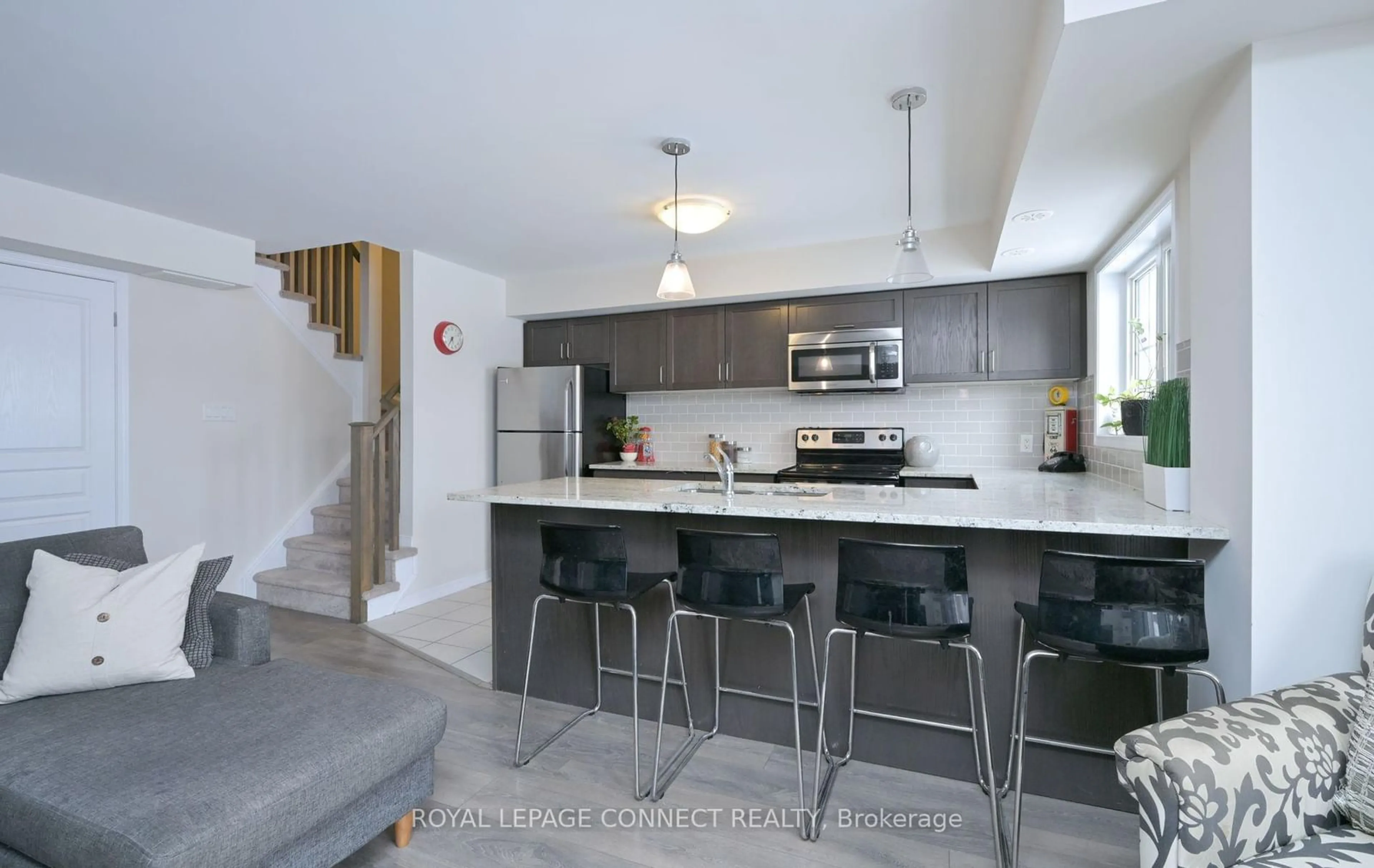 Open concept kitchen, cement floor for 2441 Greenwich Dr #95, Oakville Ontario L6M 0S3