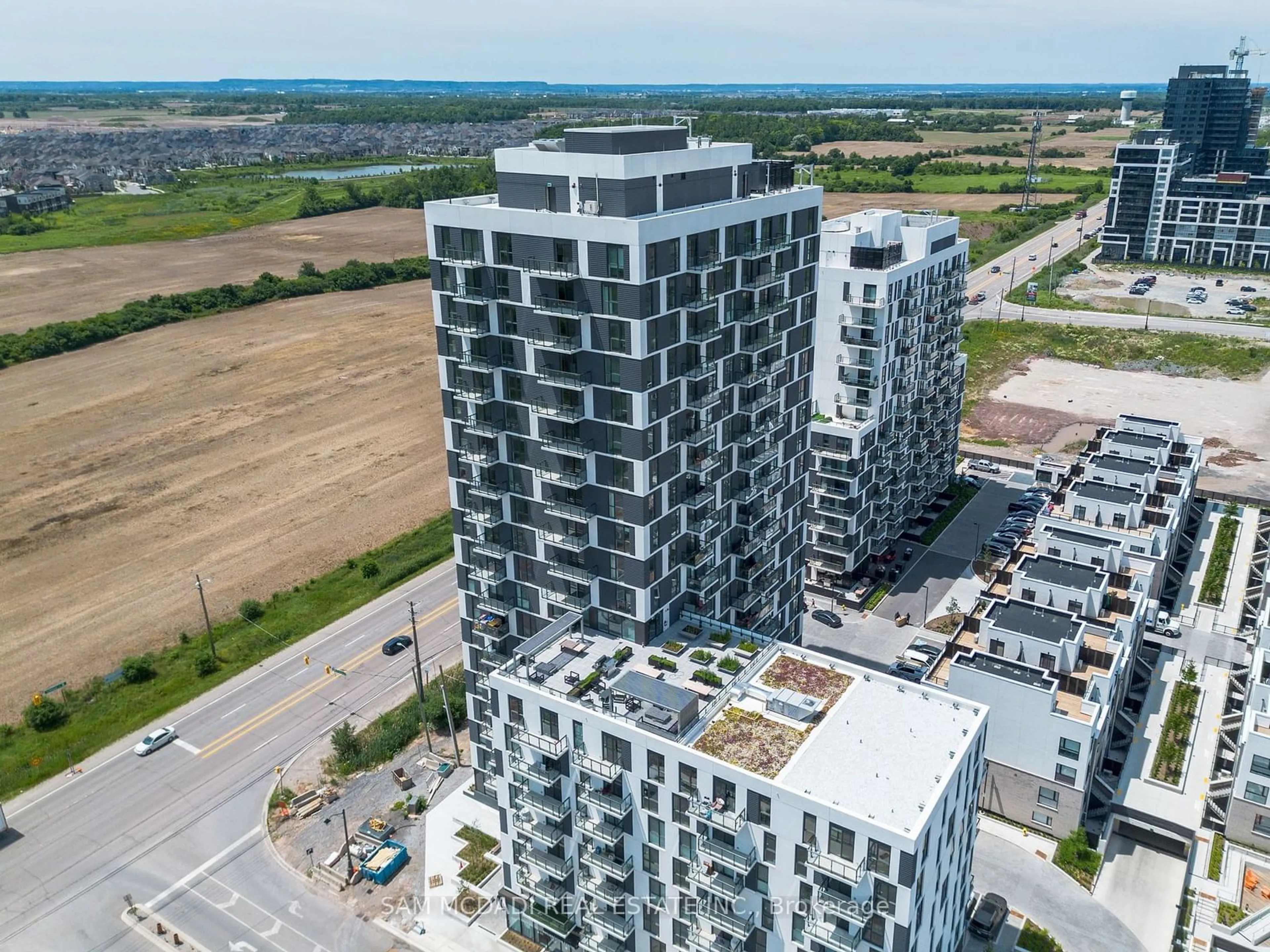 A pic from outside/outdoor area/front of a property/back of a property/a pic from drone, city buildings view from balcony for 335 Wheat Boom Dr #1508, Oakville Ontario L6H 7Y1