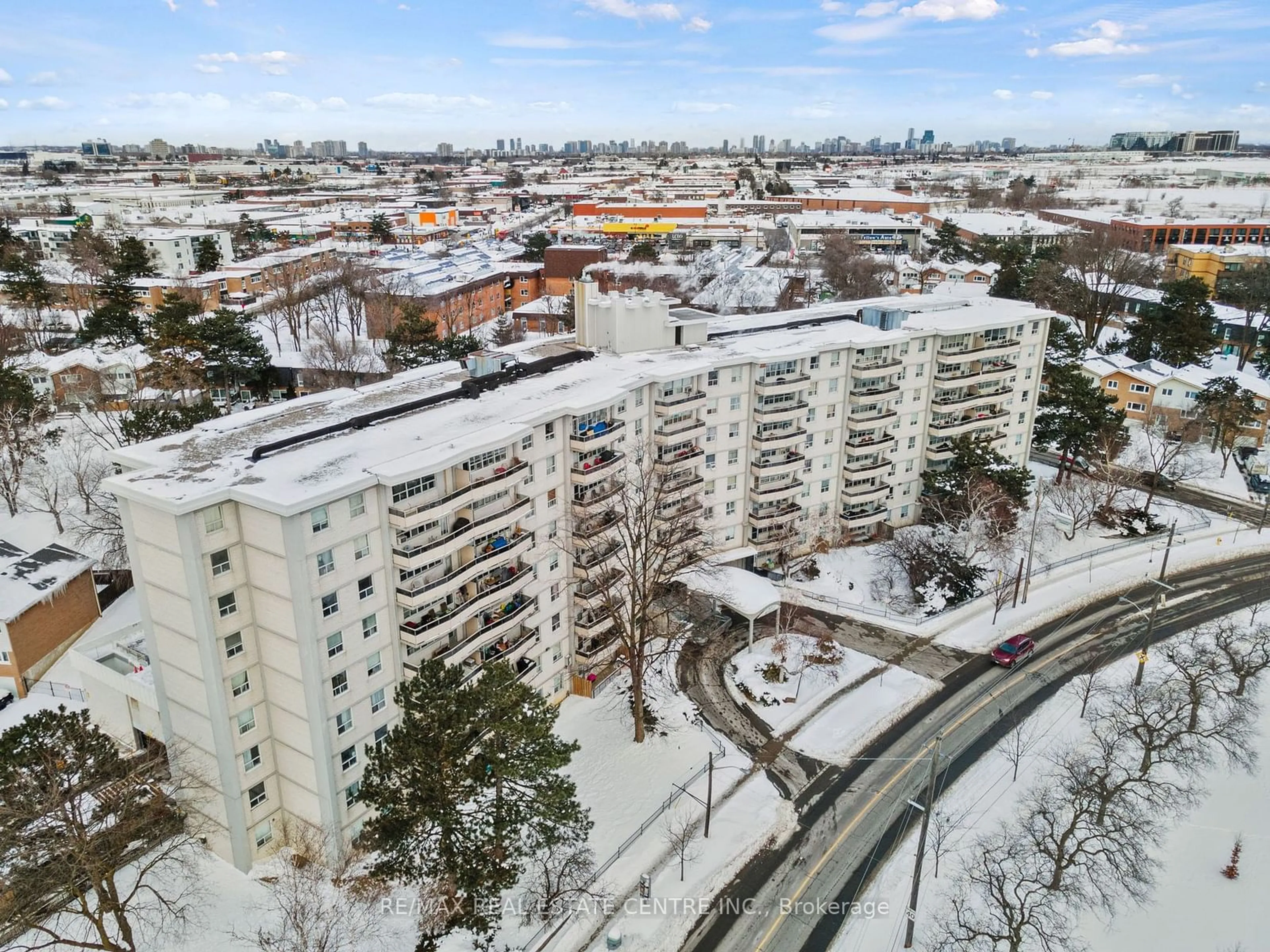 A pic from outside/outdoor area/front of a property/back of a property/a pic from drone, city buildings view from balcony for 80 Grandravine Dr #309, Toronto Ontario M3J 1B2