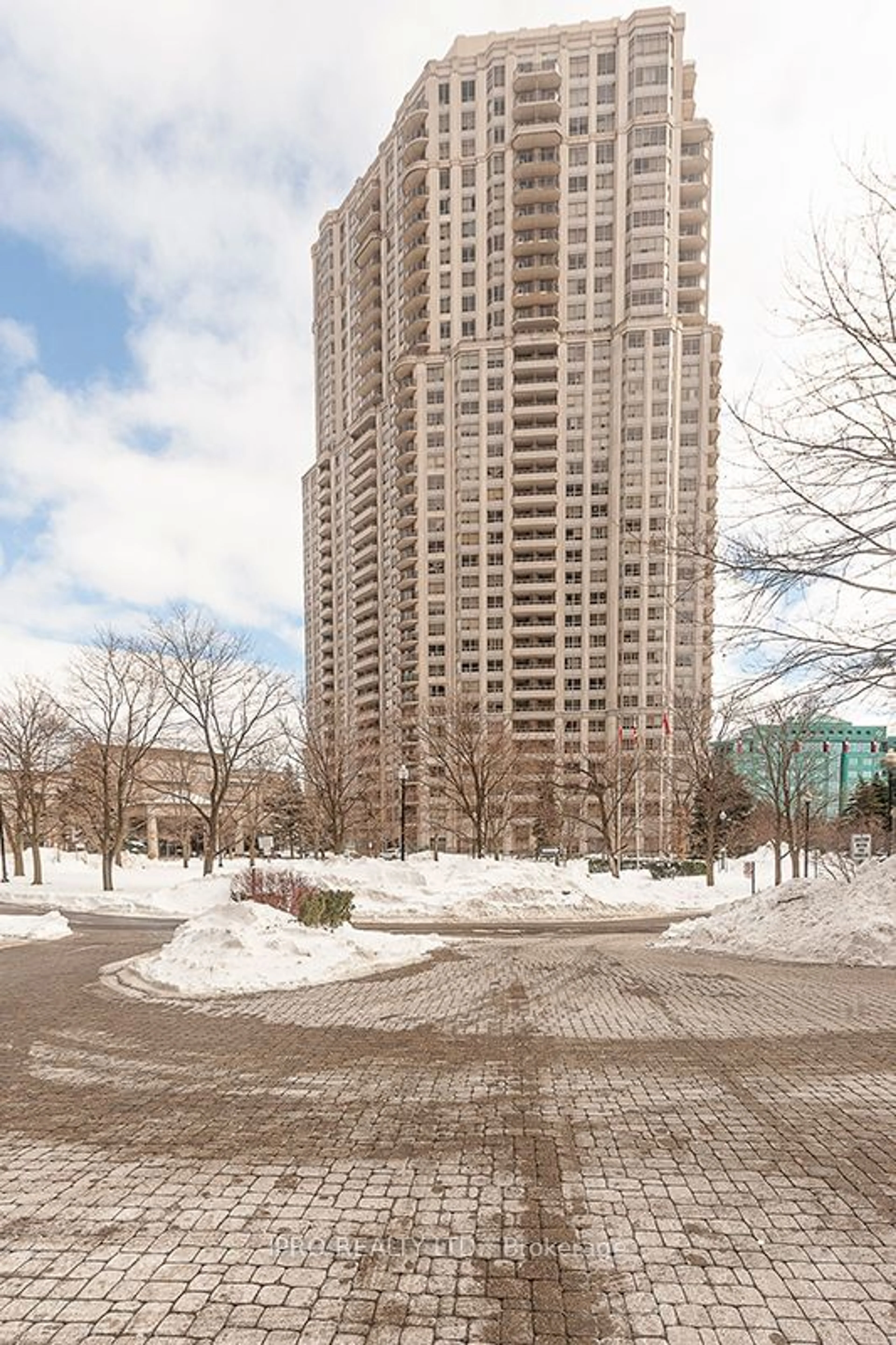 Patio, city buildings view from balcony for 25 Kingsbridge Garden Circ #716, Mississauga Ontario L5R 4B1