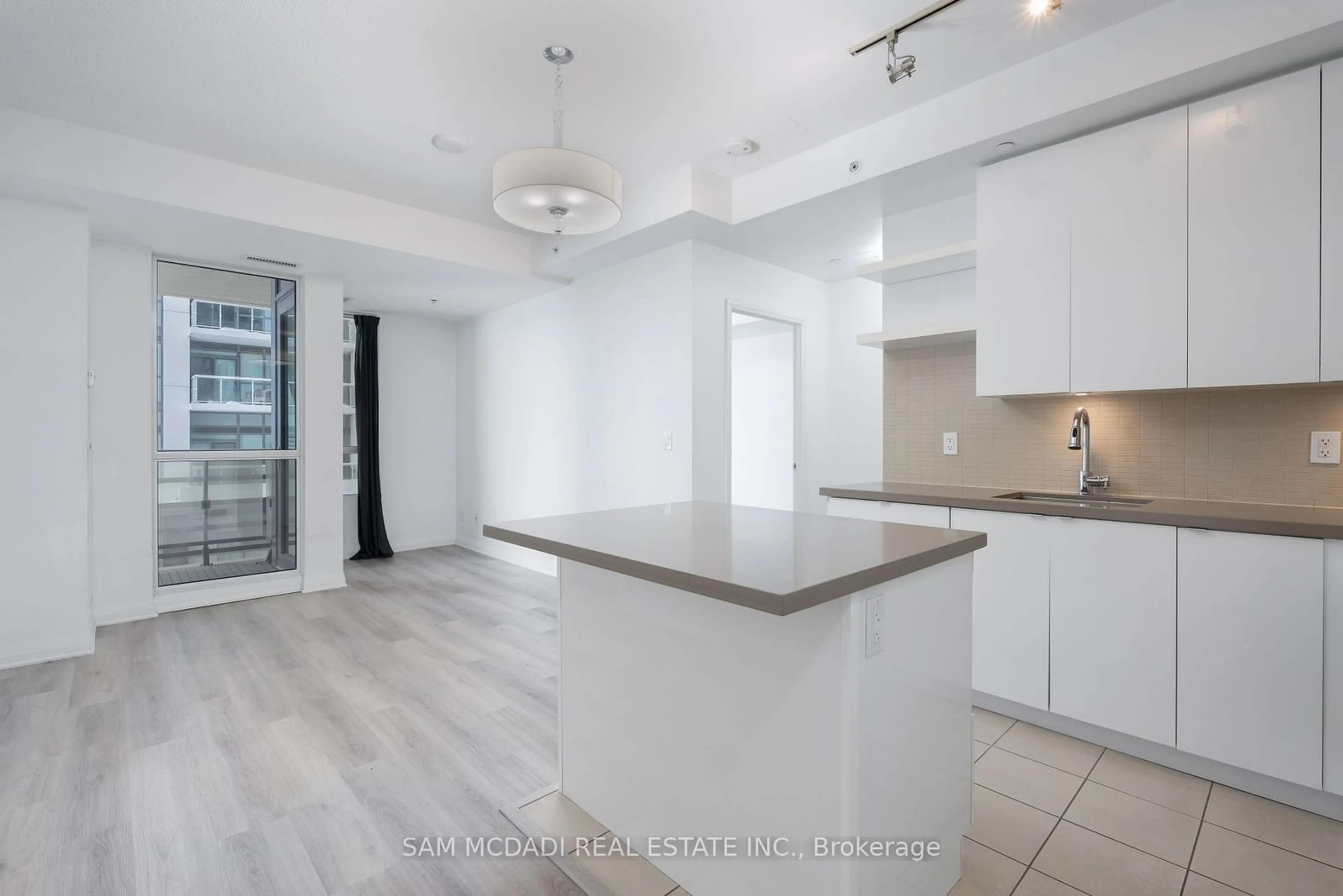 Open concept kitchen, ceramic/tile floor for 59 Annie Craig Dr #306, Toronto Ontario M8V 0C4