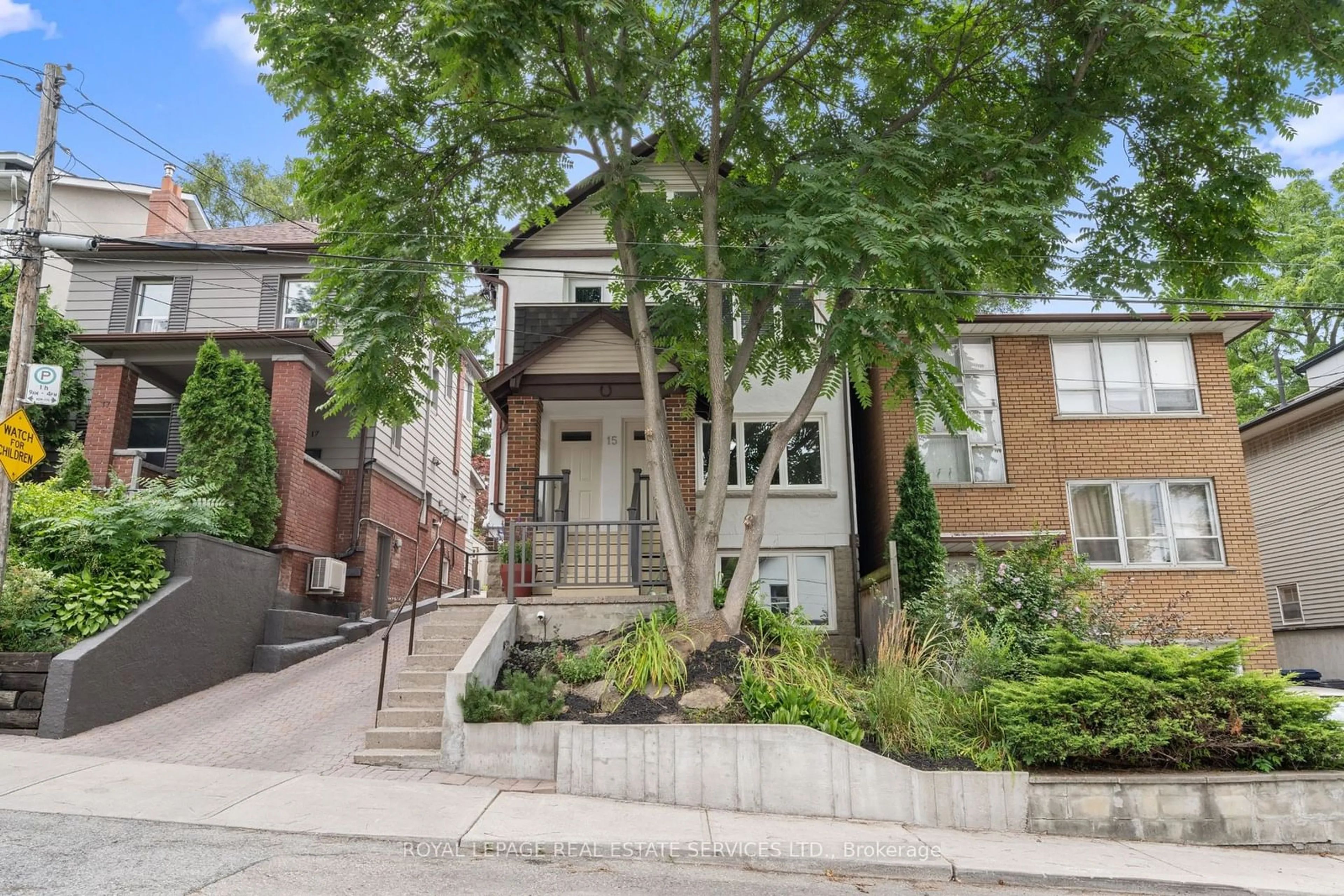 Home with brick exterior material, street for 15 Runnymede Rd, Toronto Ontario M6S 2Y1