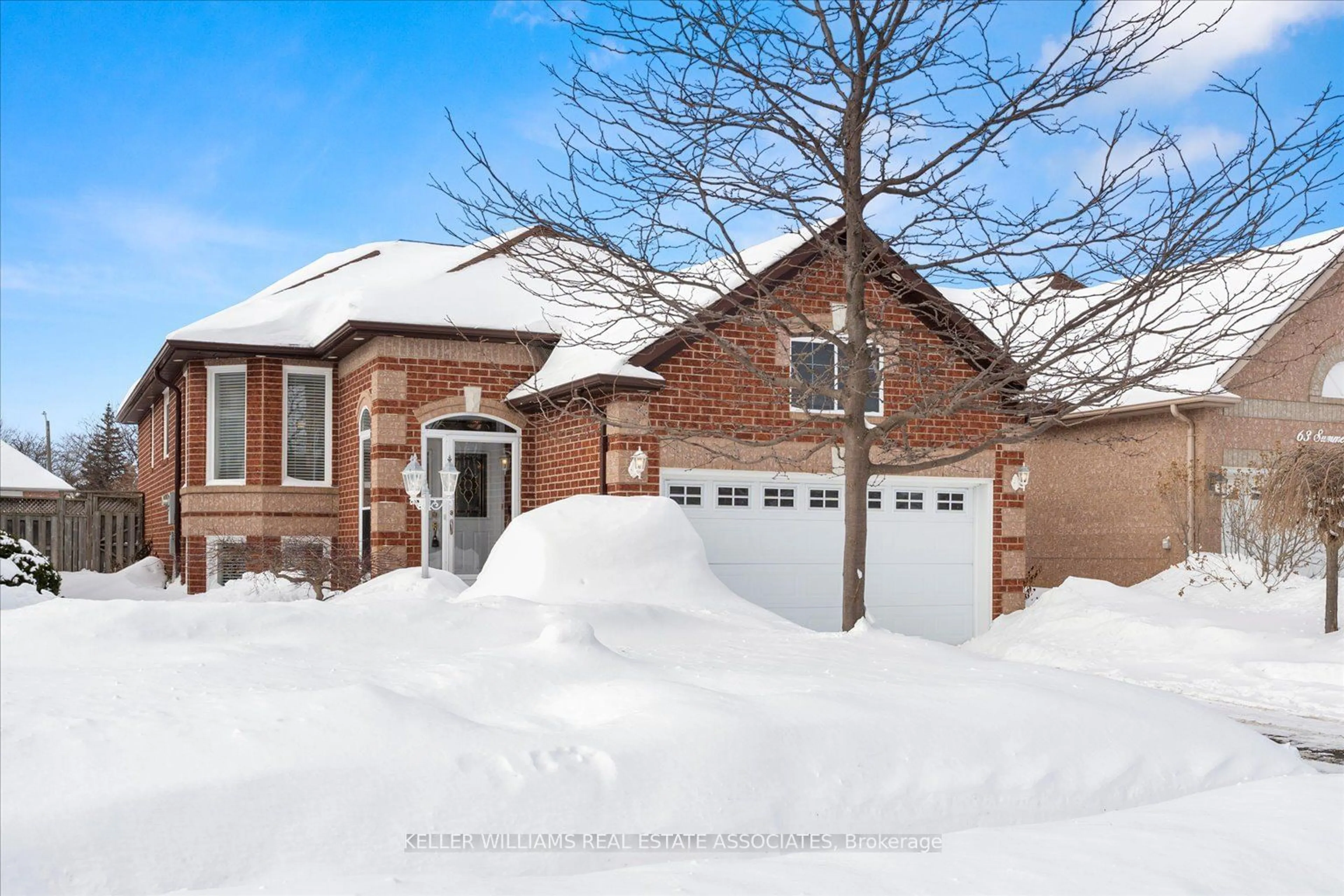 Home with brick exterior material, street for 65 Summerfield Cres, Brampton Ontario L6X 4L2