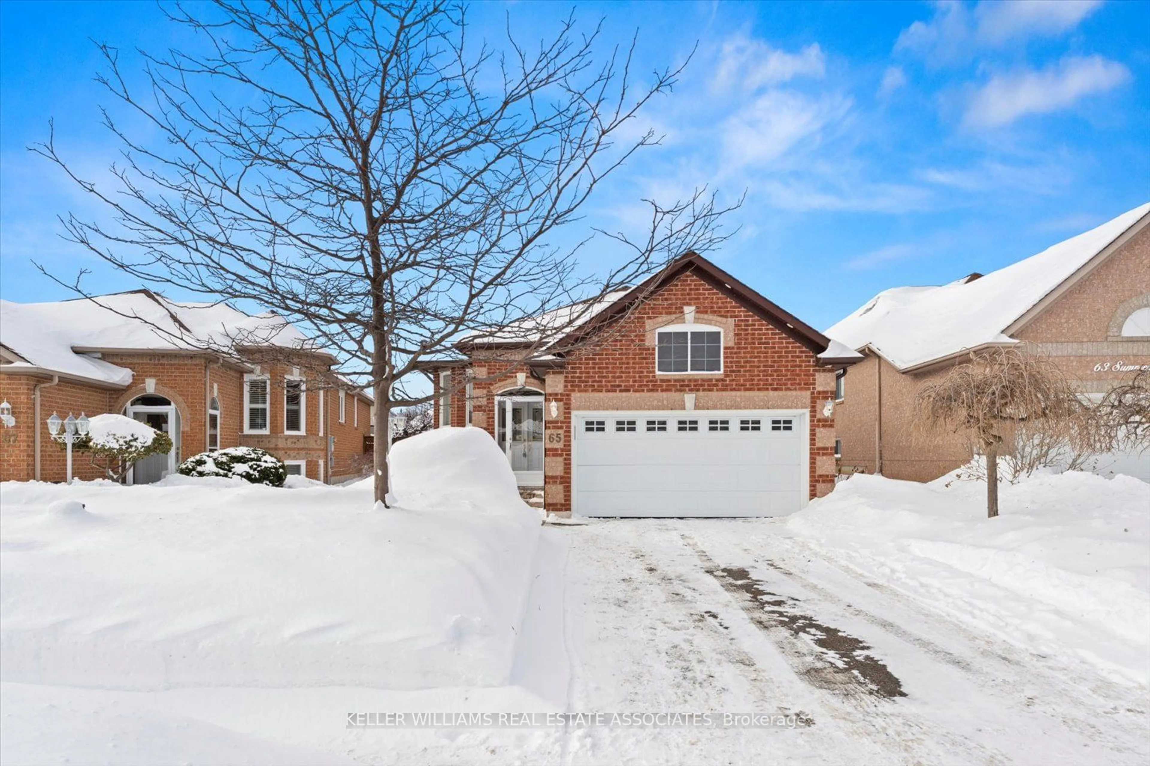 Home with brick exterior material, street for 65 Summerfield Cres, Brampton Ontario L6X 4L2