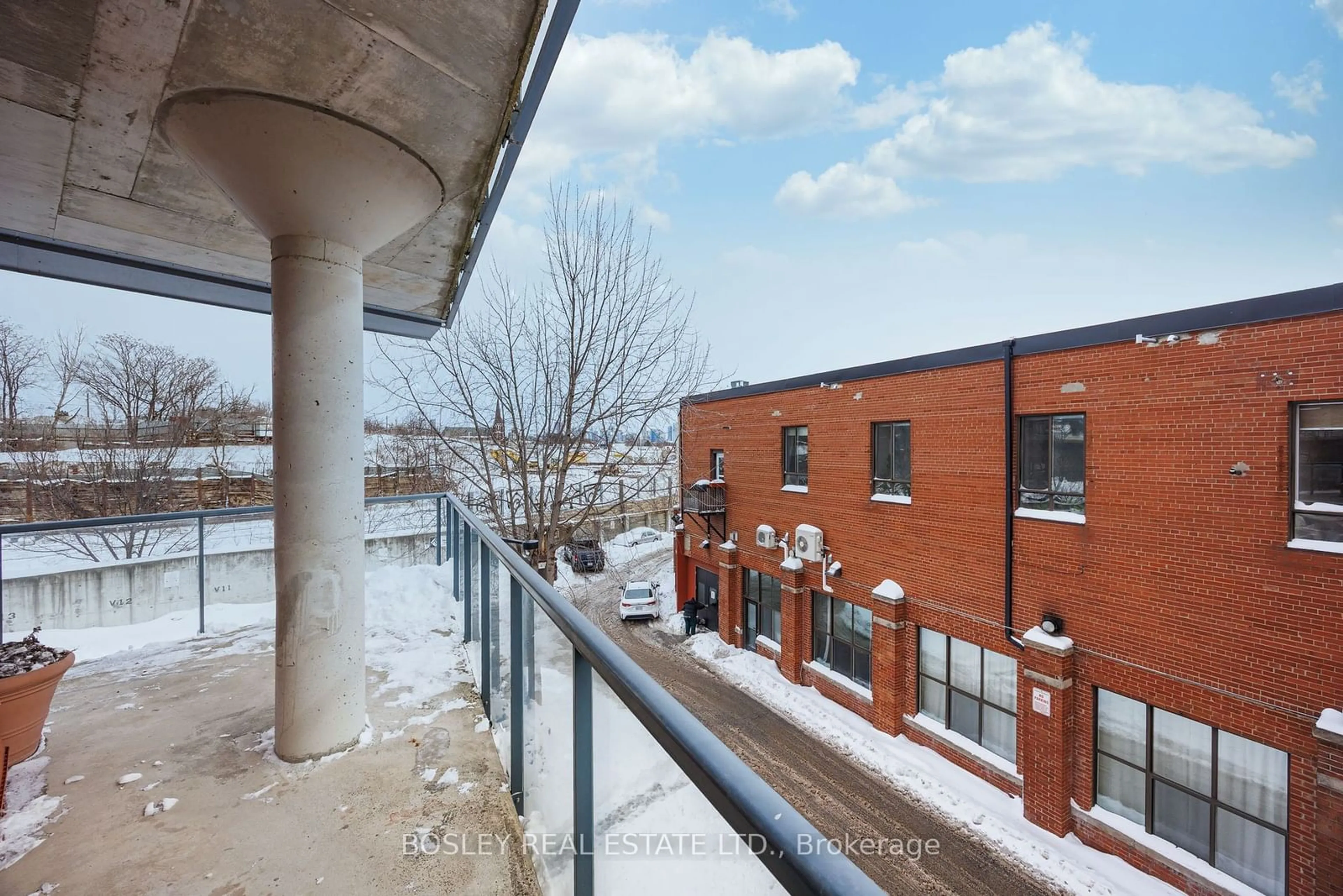 A pic from outside/outdoor area/front of a property/back of a property/a pic from drone, city buildings view from balcony for 369 Sorauren Ave #211, Toronto Ontario M6R 3C2