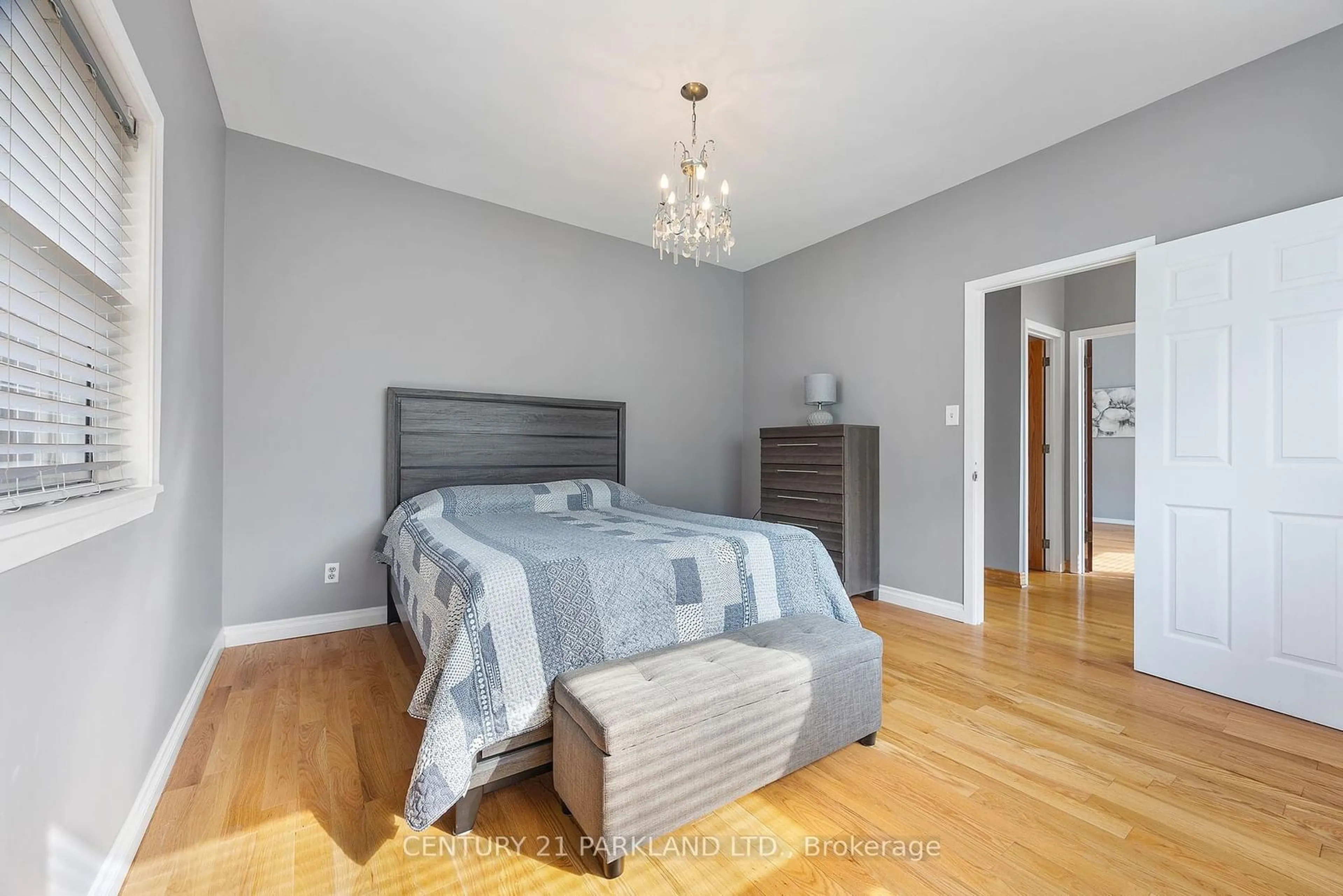 Bedroom with bed, wood/laminate floor for 114 Rosemount Ave, Toronto Ontario M6H 3H2