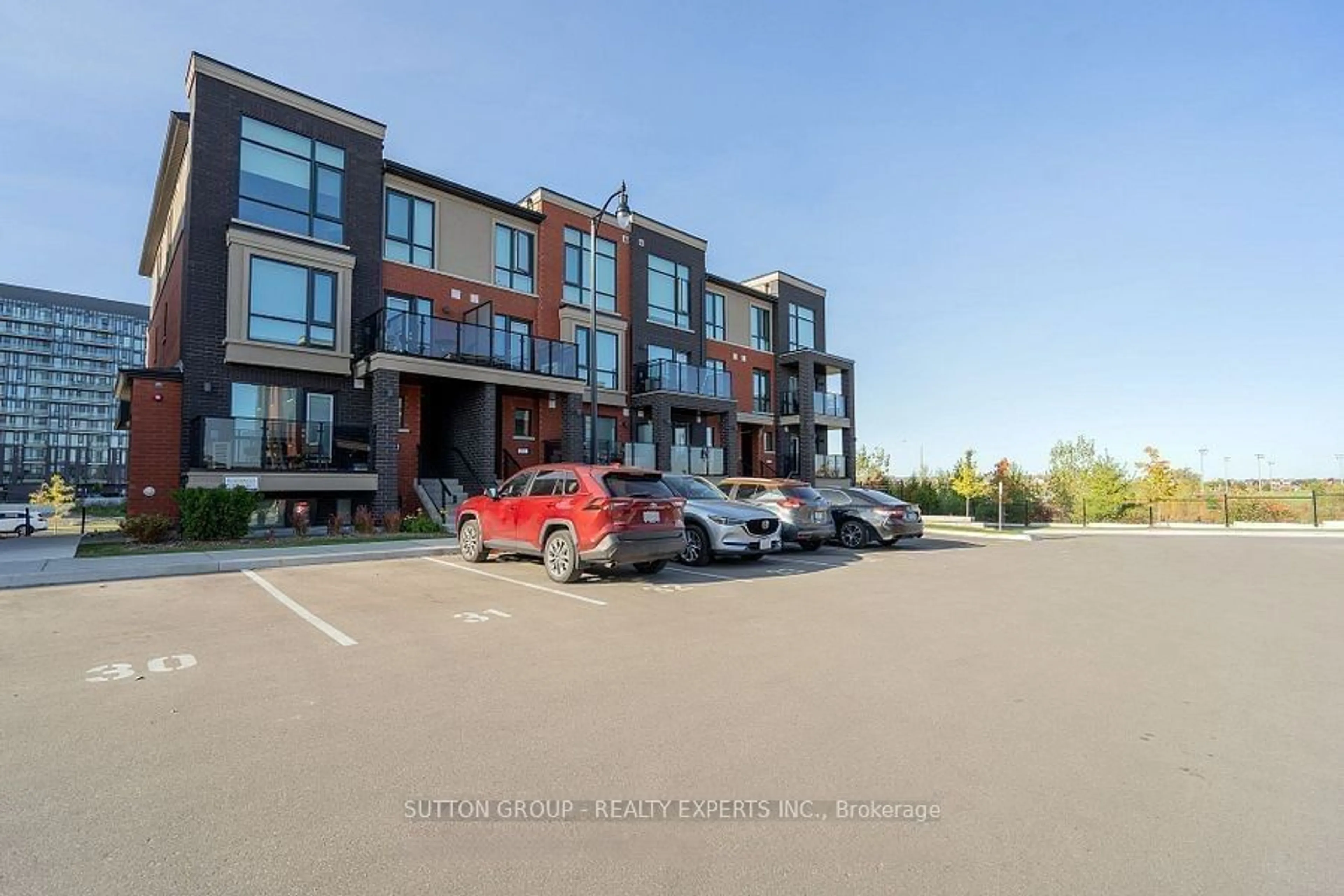 A pic from outside/outdoor area/front of a property/back of a property/a pic from drone, building for 65 Romilly Ave #8, Brampton Ontario L7A 5L8