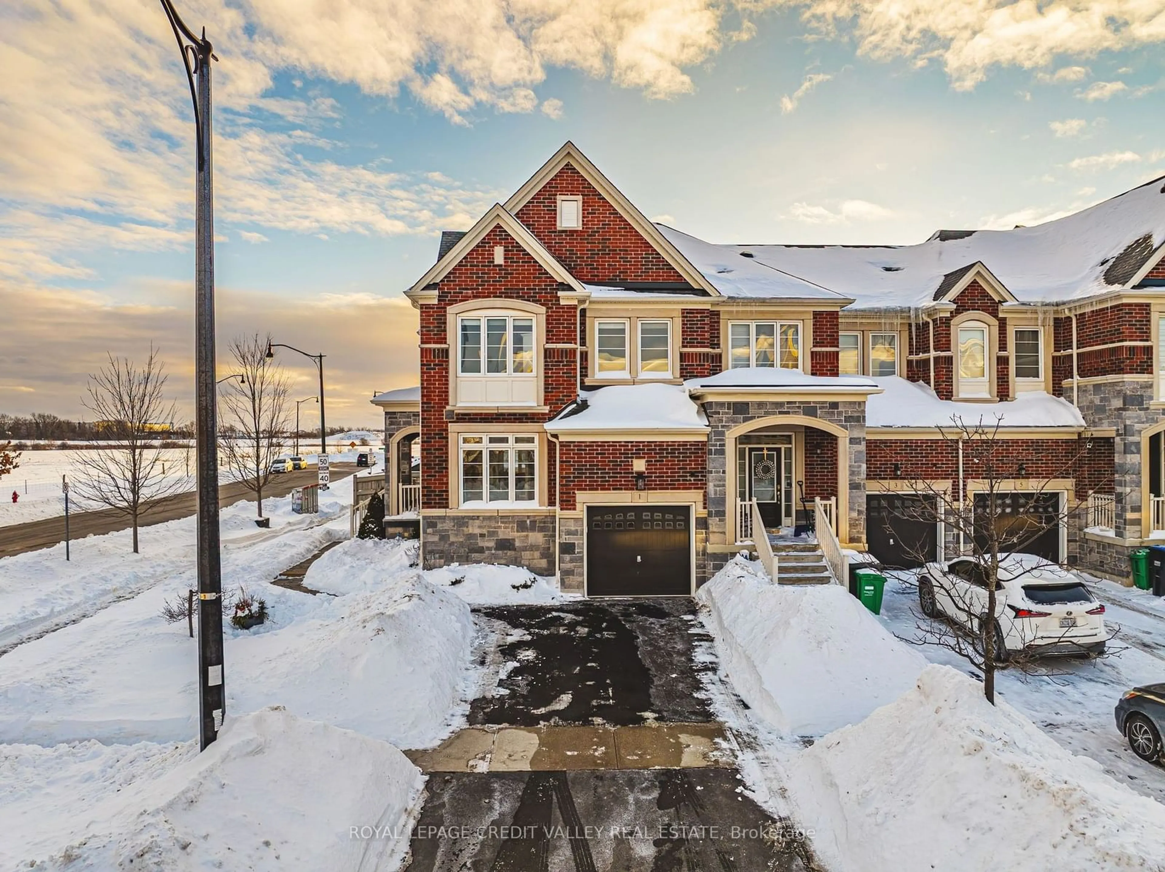 A pic from outside/outdoor area/front of a property/back of a property/a pic from drone, street for 1 Little Britain Cres, Brampton Ontario L6Y 6A3