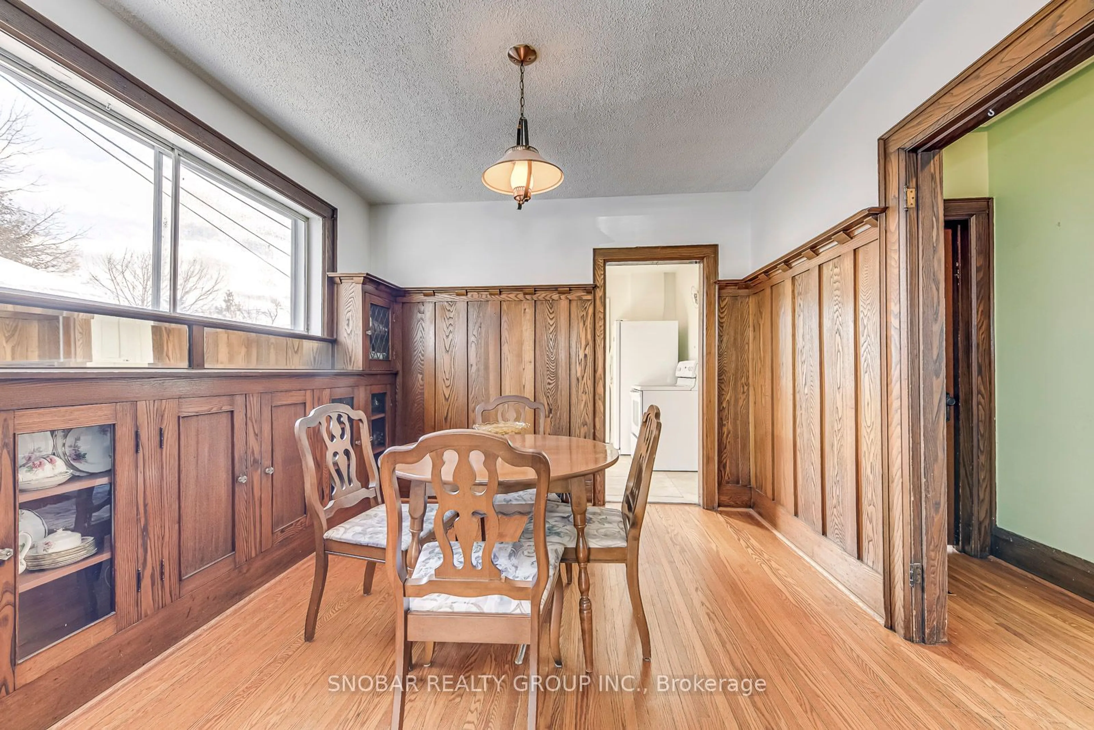 Dining room, wood/laminate floor for 82 Superior Ave, Toronto Ontario M8V 2M8