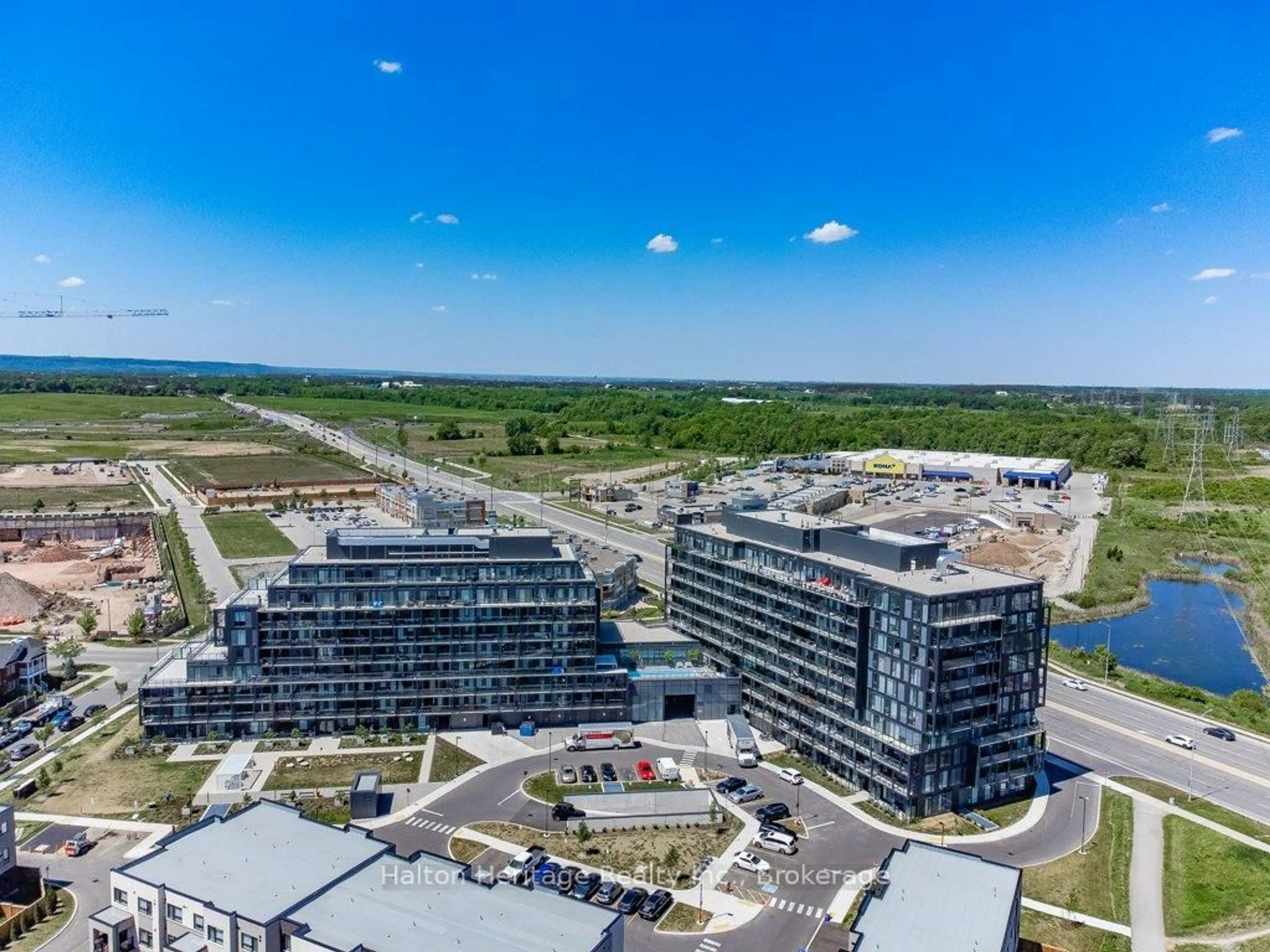 A pic from outside/outdoor area/front of a property/back of a property/a pic from drone, city buildings view from balcony for 3200 Dakota Common Clse #B602, Burlington Ontario L7M 2A7