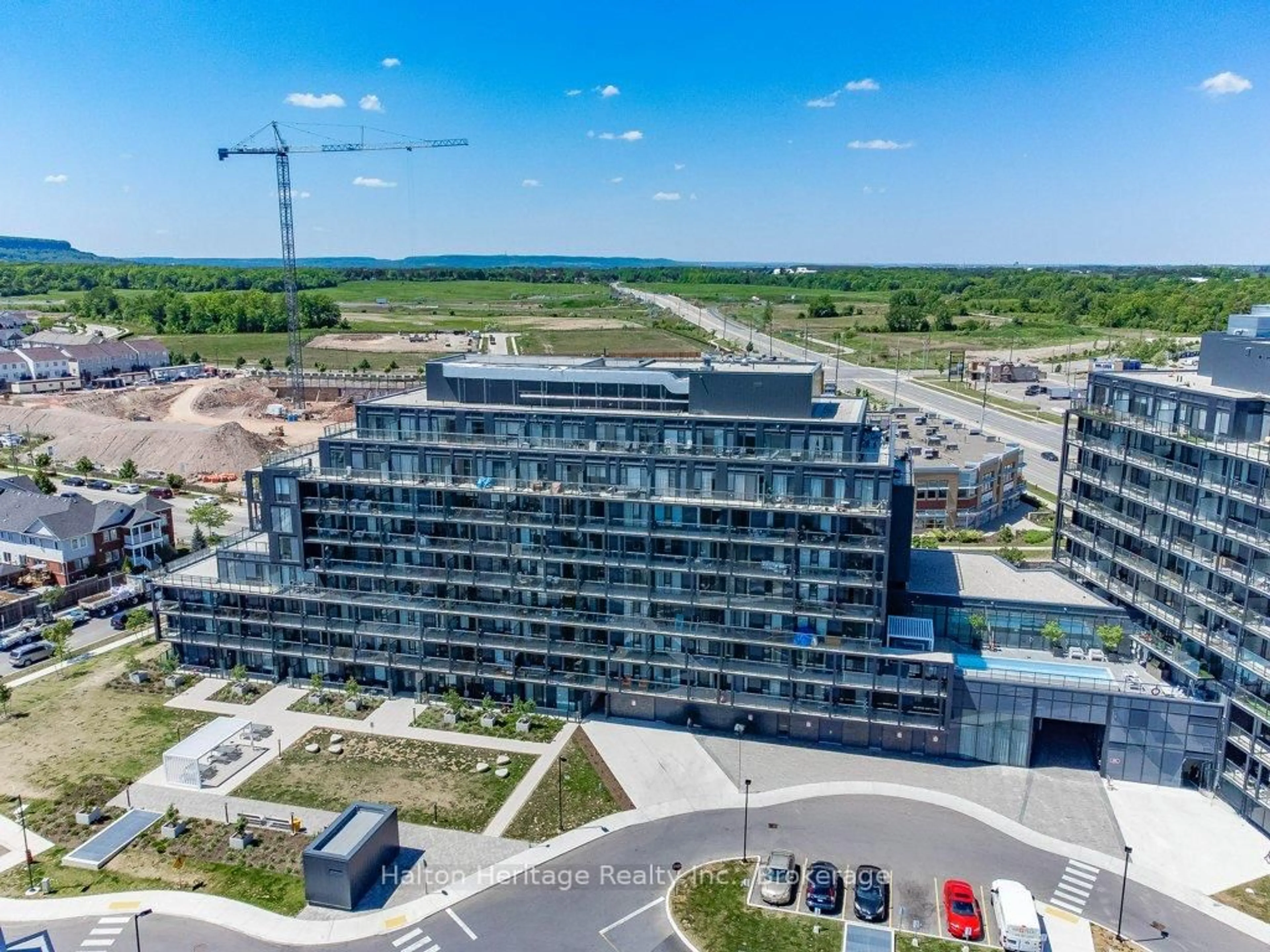 A pic from outside/outdoor area/front of a property/back of a property/a pic from drone, building for 3200 Dakota Common Clse #B602, Burlington Ontario L7M 2A7