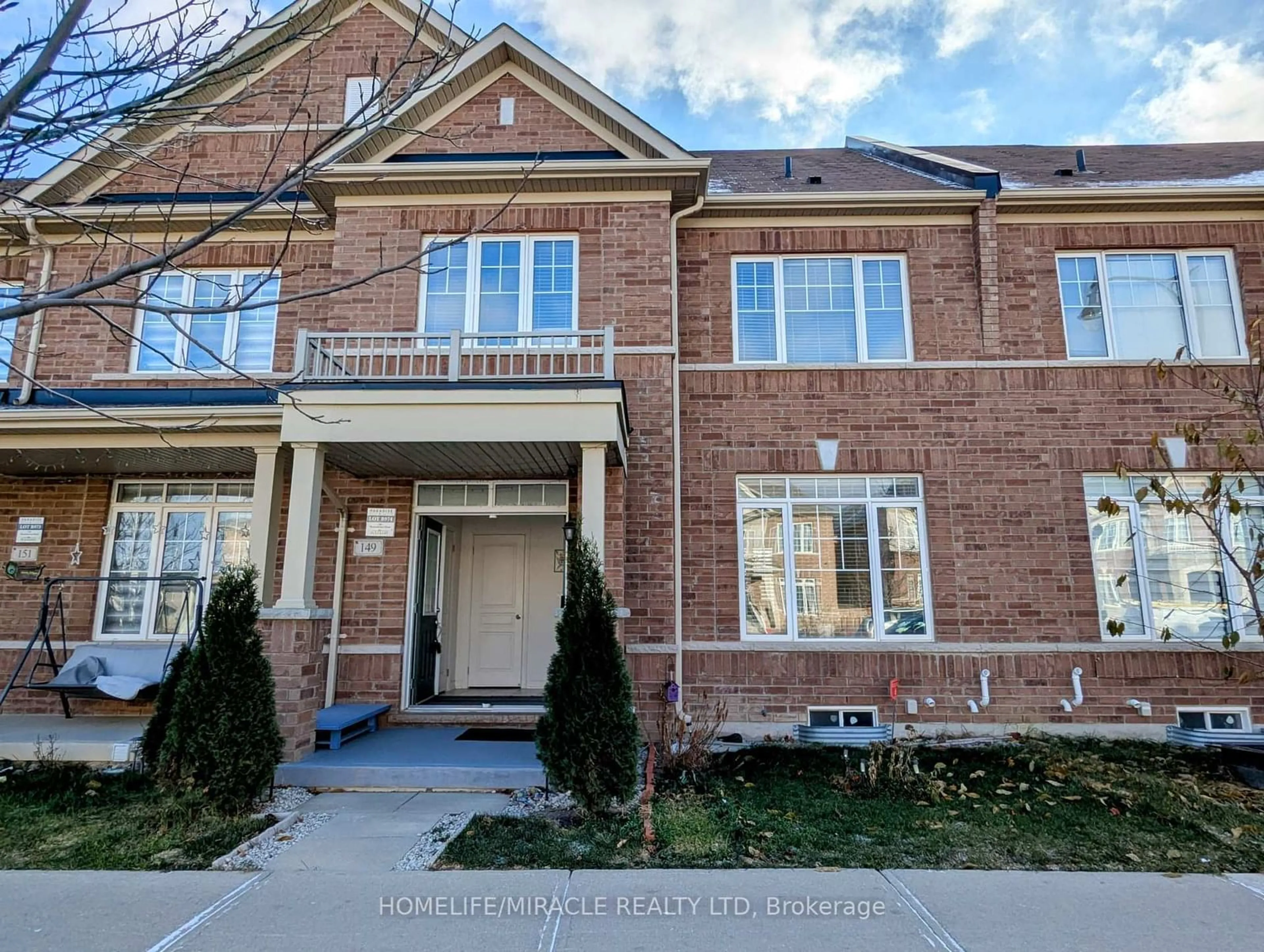 Home with brick exterior material, street for 149 Remembrance Rd, Brampton Ontario L7A 3Y2