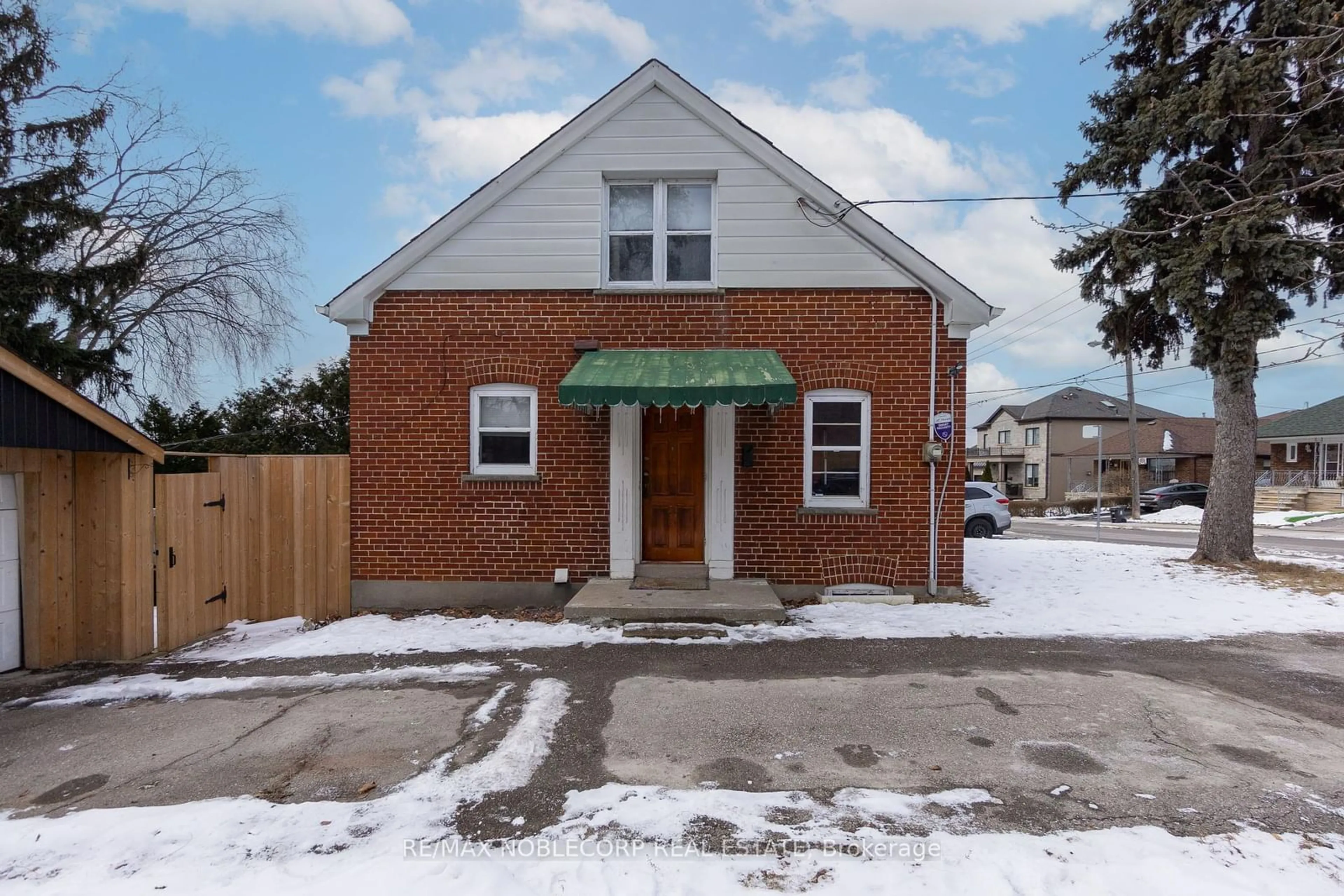 Home with brick exterior material, street for 77 Lonborough Ave, Toronto Ontario M6M 1X7