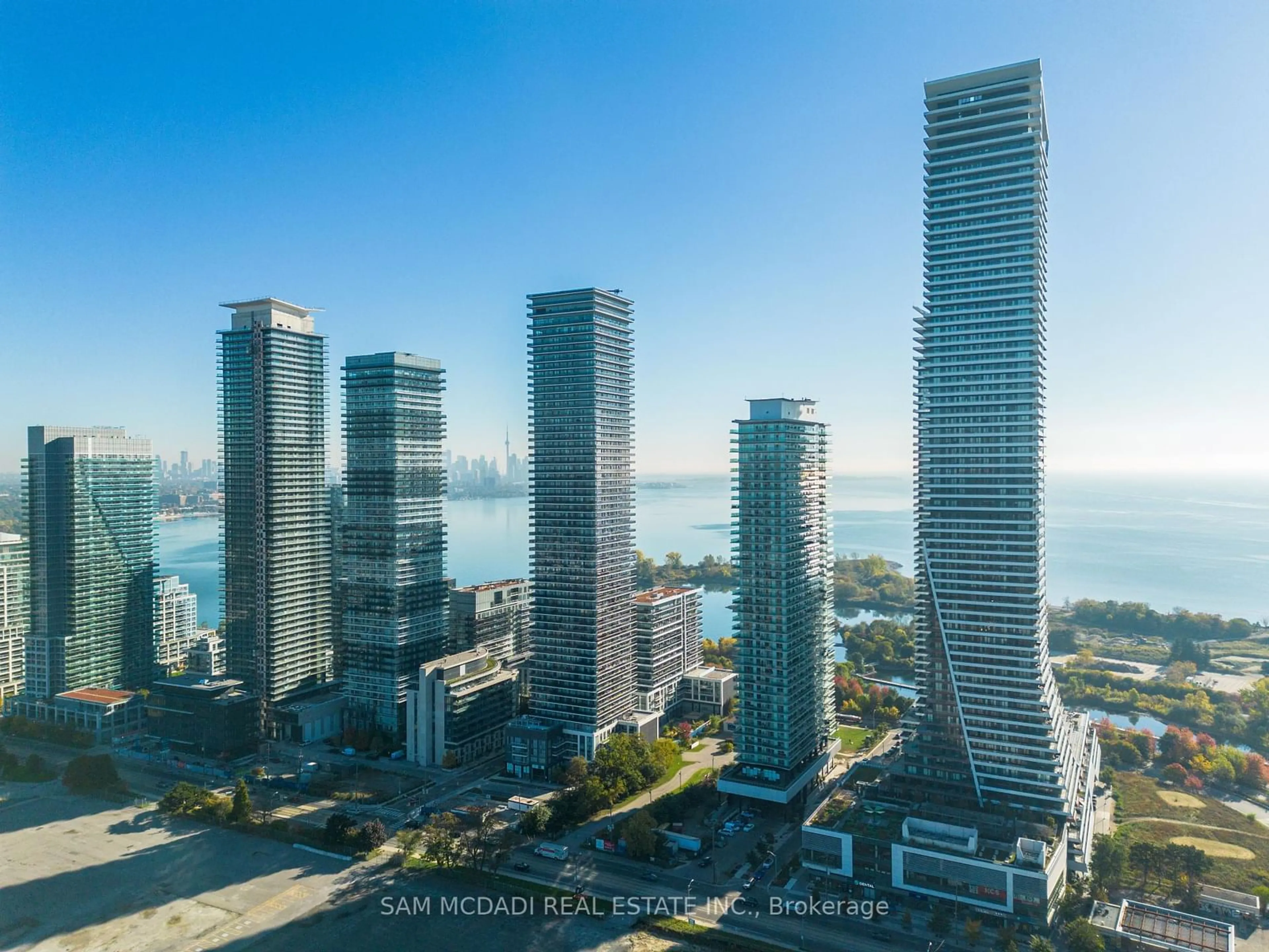 A pic from outside/outdoor area/front of a property/back of a property/a pic from drone, city buildings view from balcony for 30 Shore Breeze Dr #1024, Toronto Ontario M8V 0J1