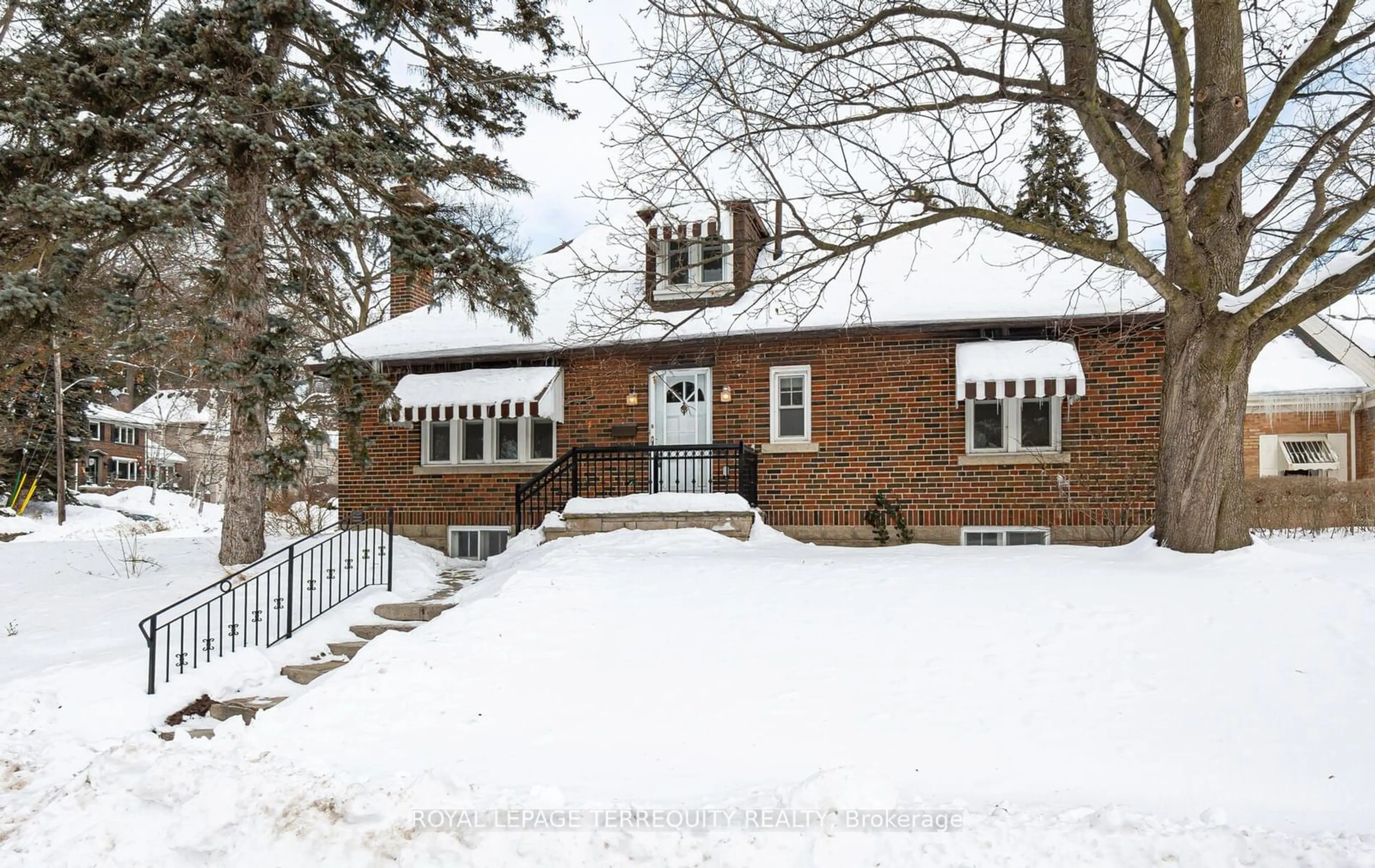 Home with brick exterior material, street for 21 Orchard Crest Rd, Toronto Ontario M6S 4N2