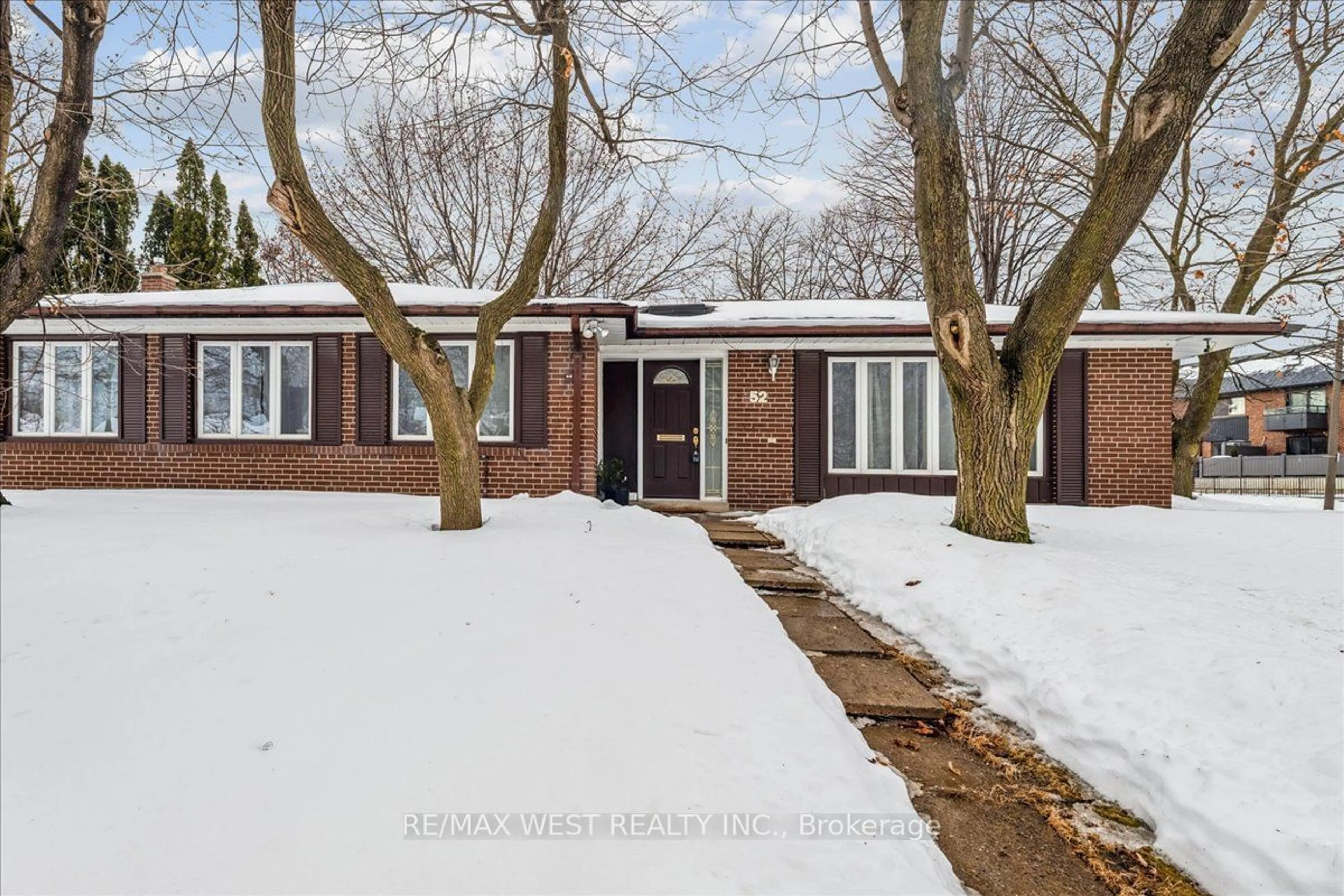 Home with brick exterior material, street for 52 Broadfield Dr, Toronto Ontario M9C 1L7