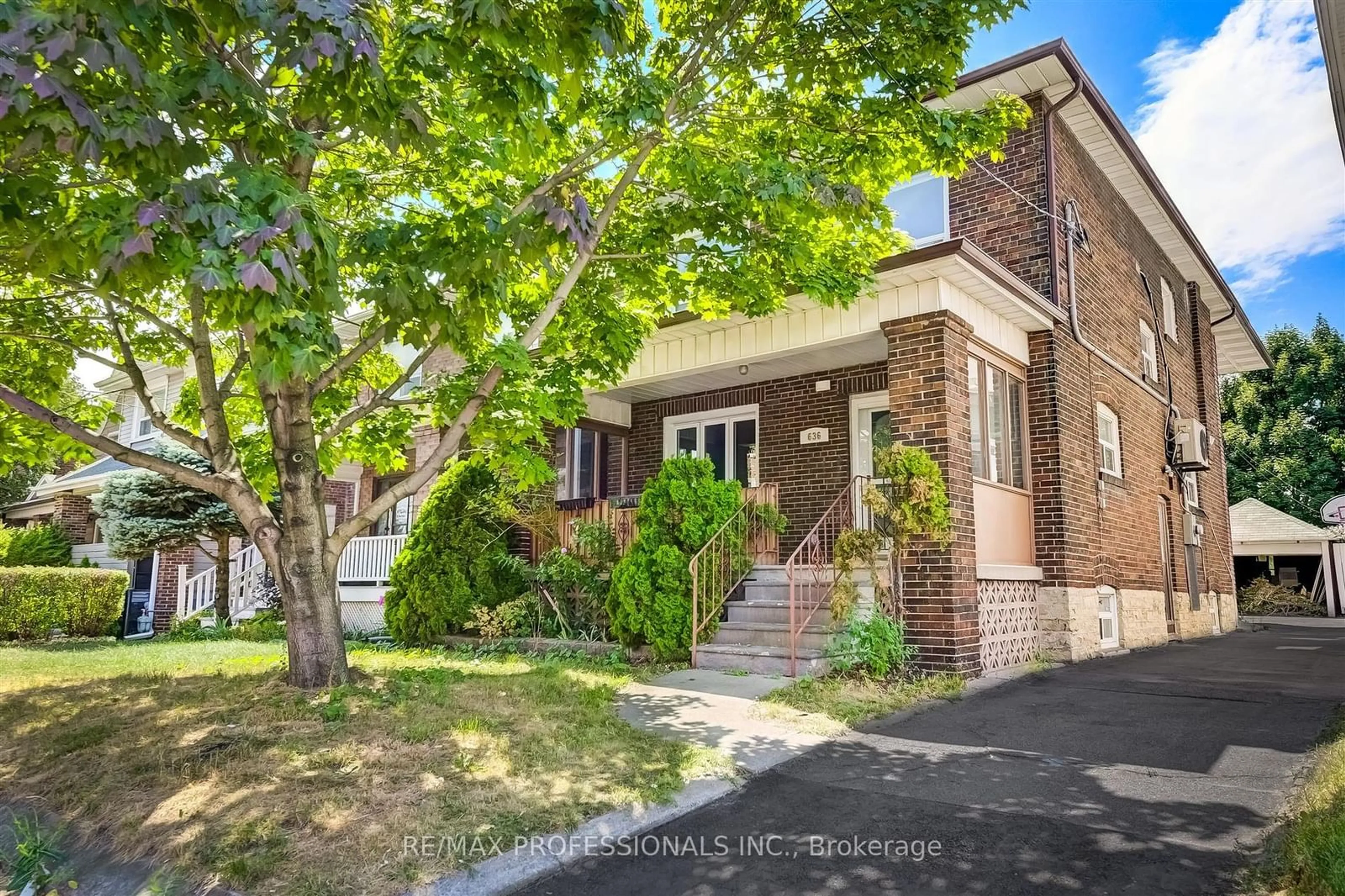 Home with brick exterior material, street for 636 Runnymede Rd, Toronto Ontario M6S 3A2