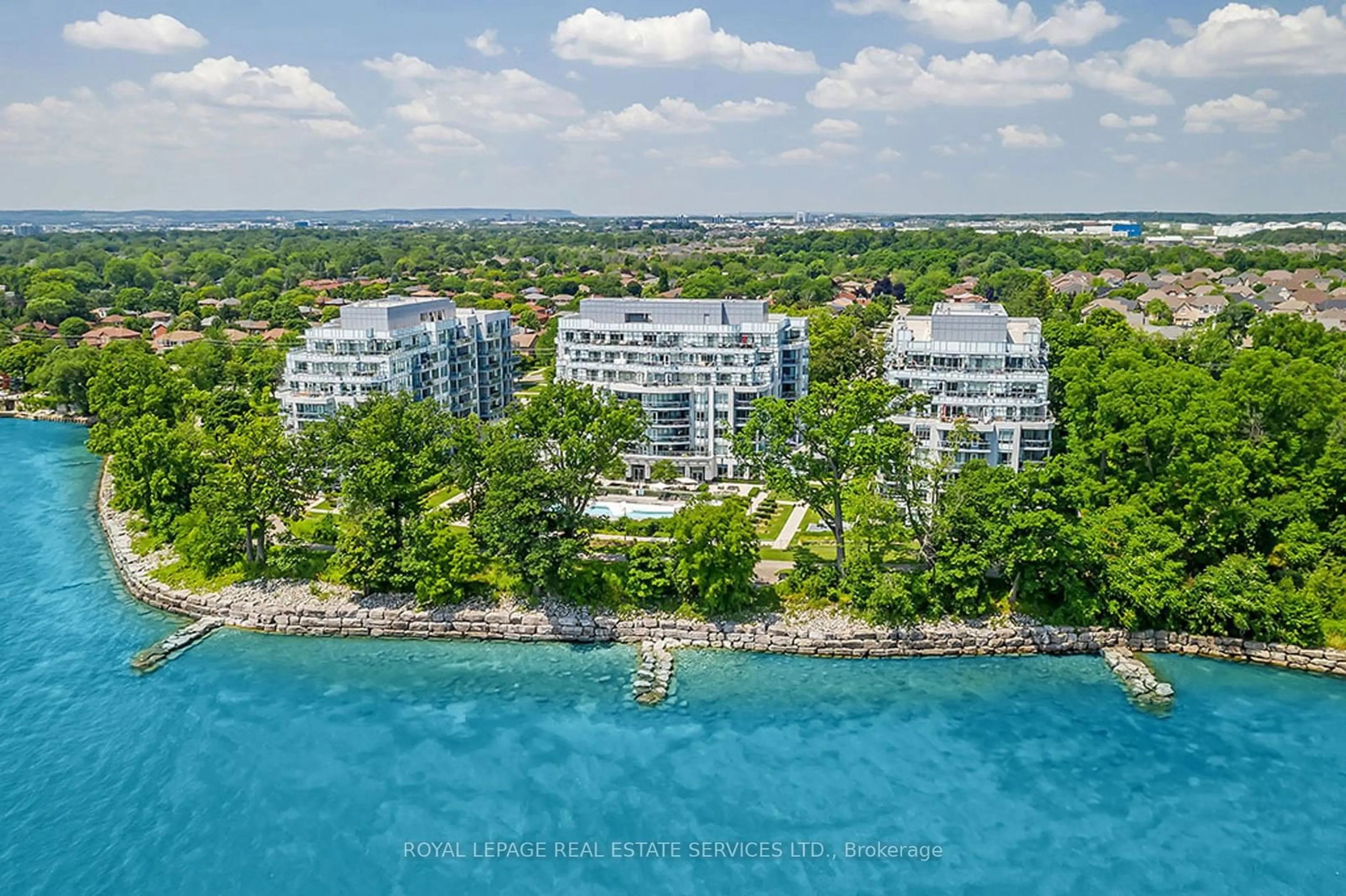 A pic from outside/outdoor area/front of a property/back of a property/a pic from drone, water/lake/river/ocean view for 3500 Lakeshore Rd #513, Oakville Ontario L6L 0B4