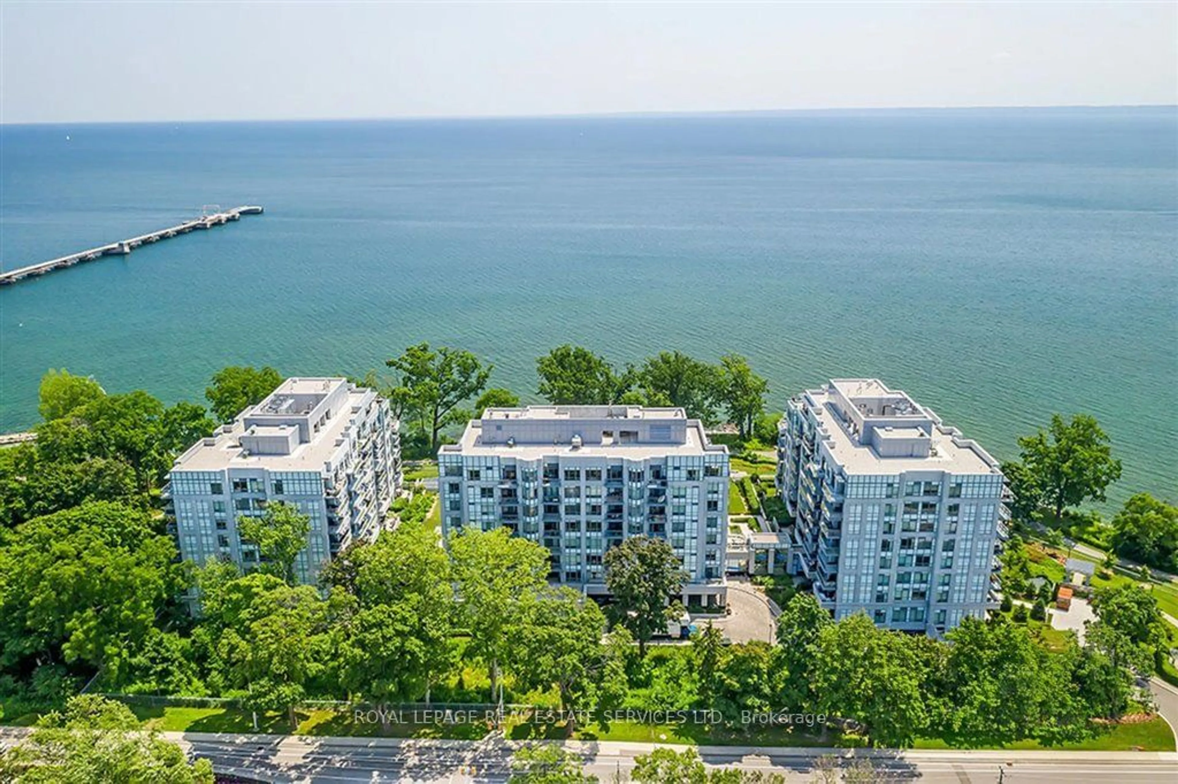 A pic from outside/outdoor area/front of a property/back of a property/a pic from drone, water/lake/river/ocean view for 3500 Lakeshore Rd #513, Oakville Ontario L6L 0B4