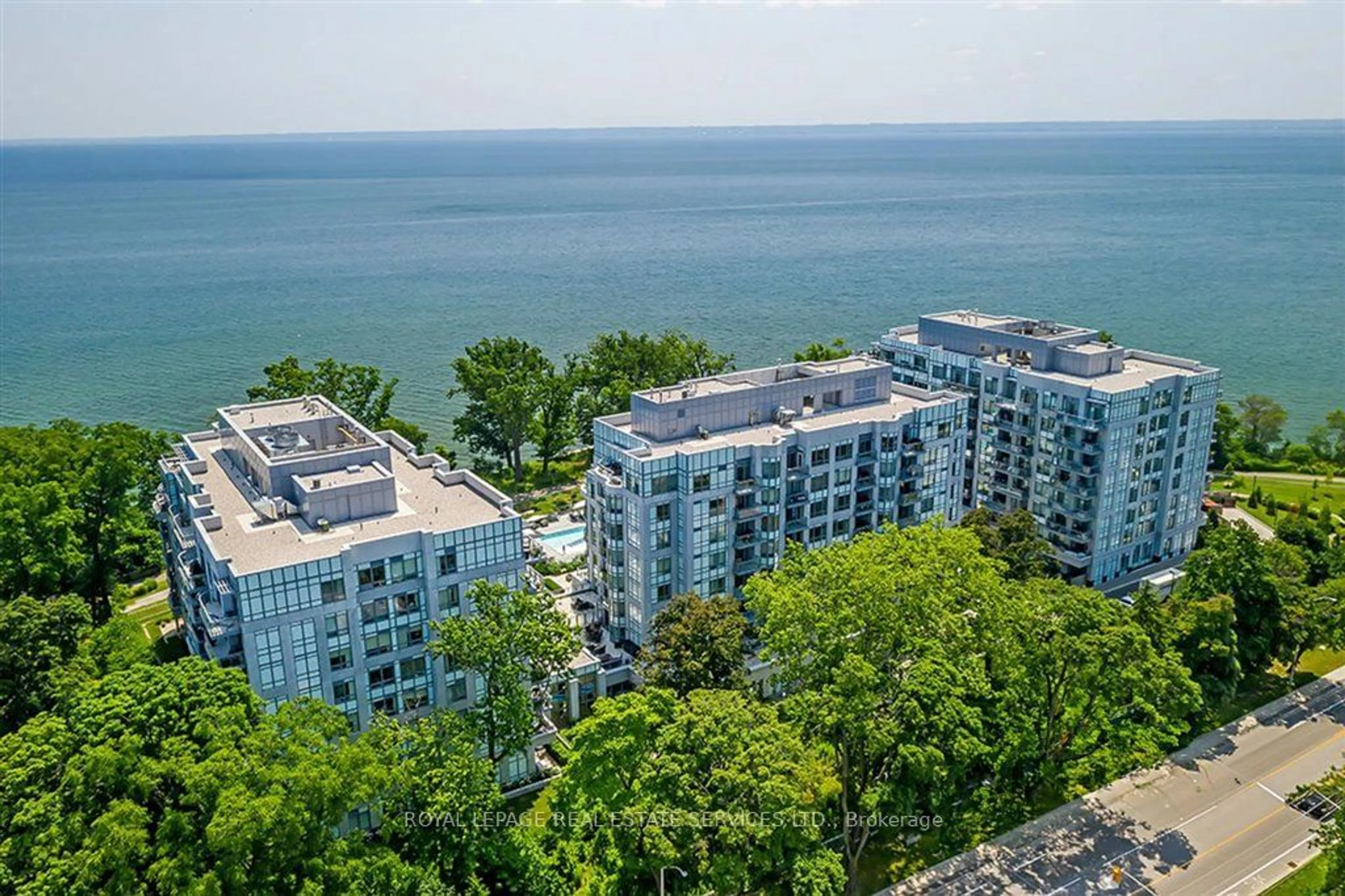 A pic from outside/outdoor area/front of a property/back of a property/a pic from drone, water/lake/river/ocean view for 3500 Lakeshore Rd #513, Oakville Ontario L6L 0B4