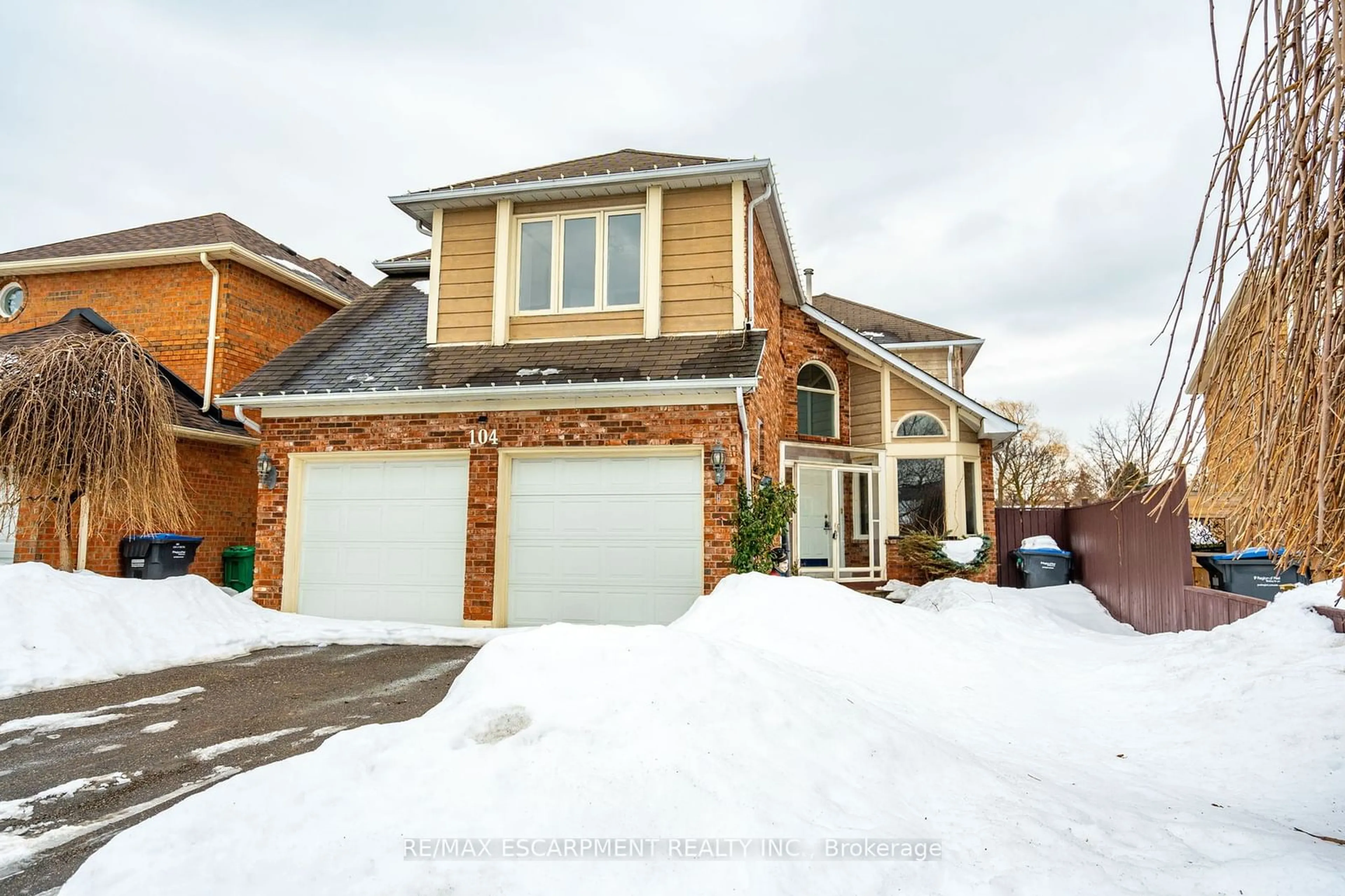 Home with brick exterior material, street for 104 Lord Simcoe Dr, Brampton Ontario L6S 5G9