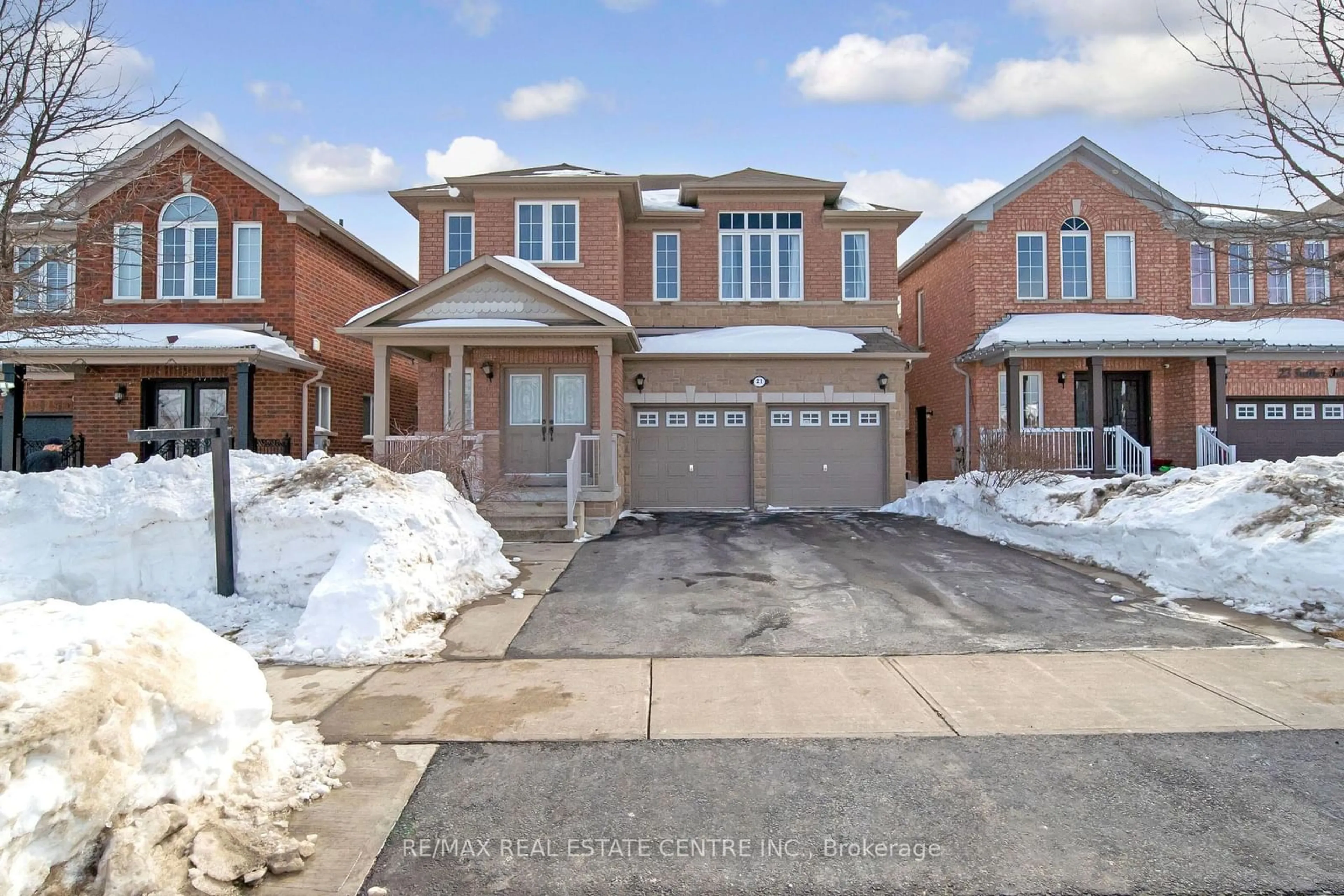 Home with brick exterior material, street for 21 Father Tobin Rd, Brampton Ontario L6R 3K2