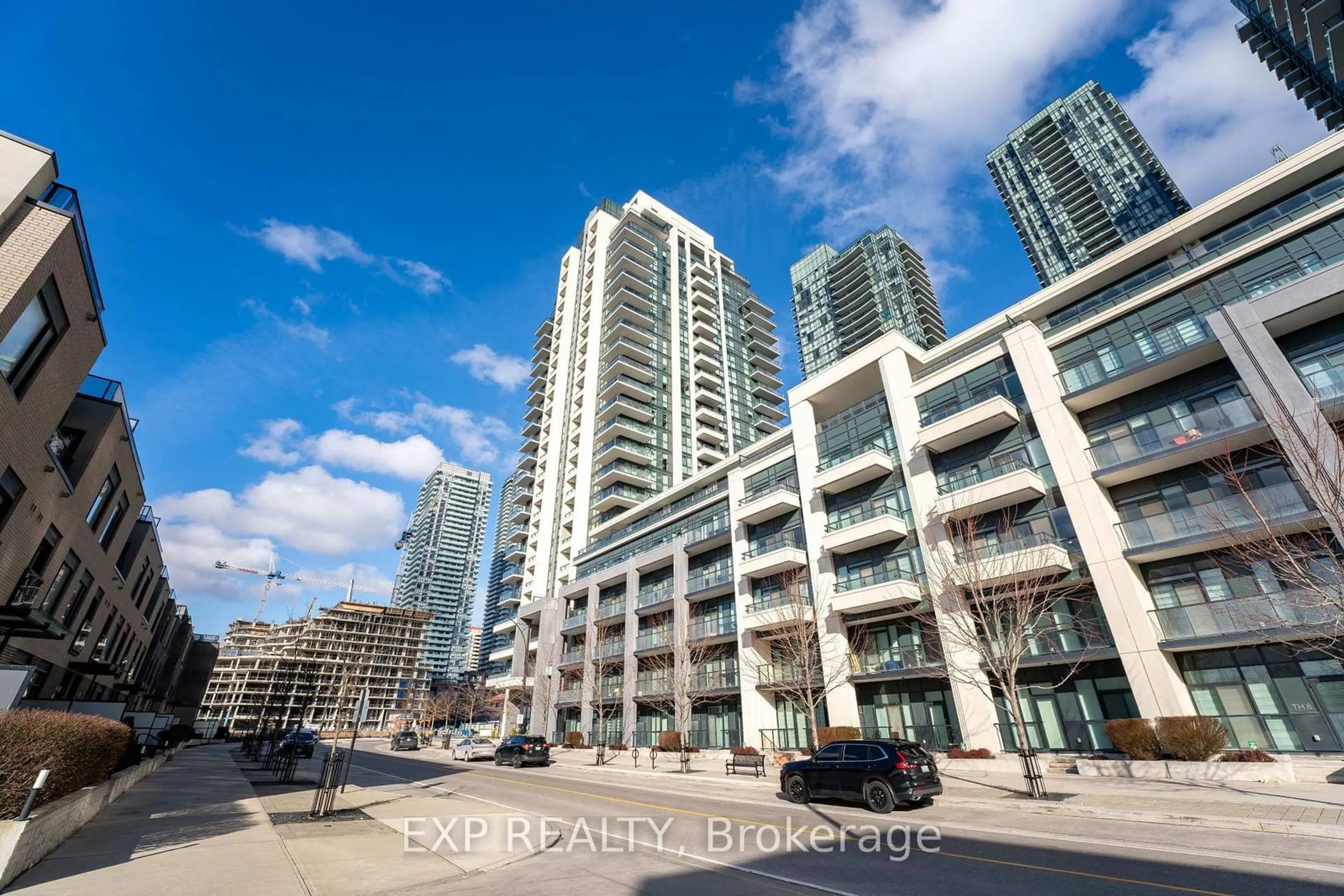 Patio, city buildings view from balcony for 4085 Parkside Village Dr #1001, Mississauga Ontario L5B 0K8