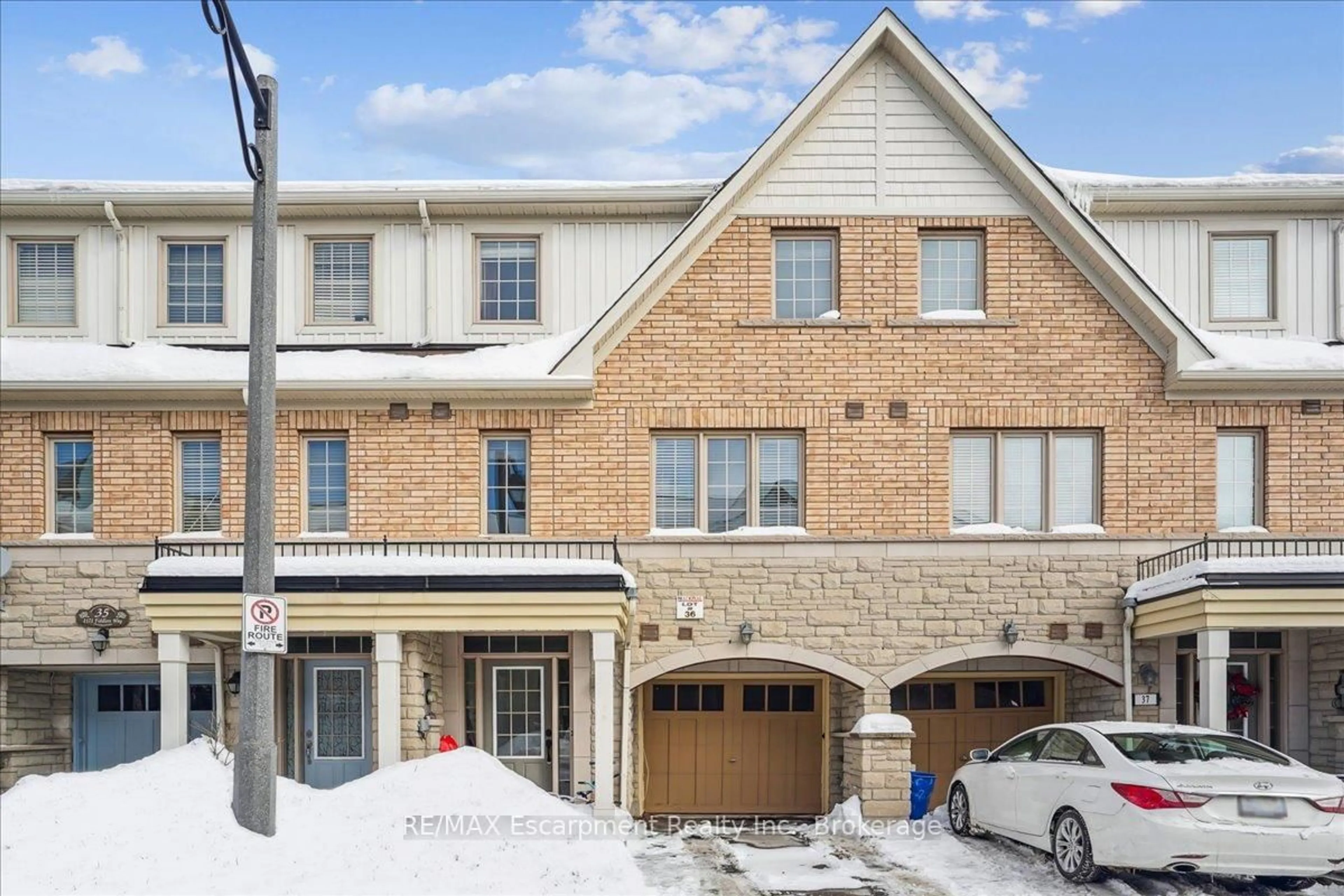 Home with brick exterior material, street for 2171 Fiddlers Way #36, Oakville Ontario L6M 0R9