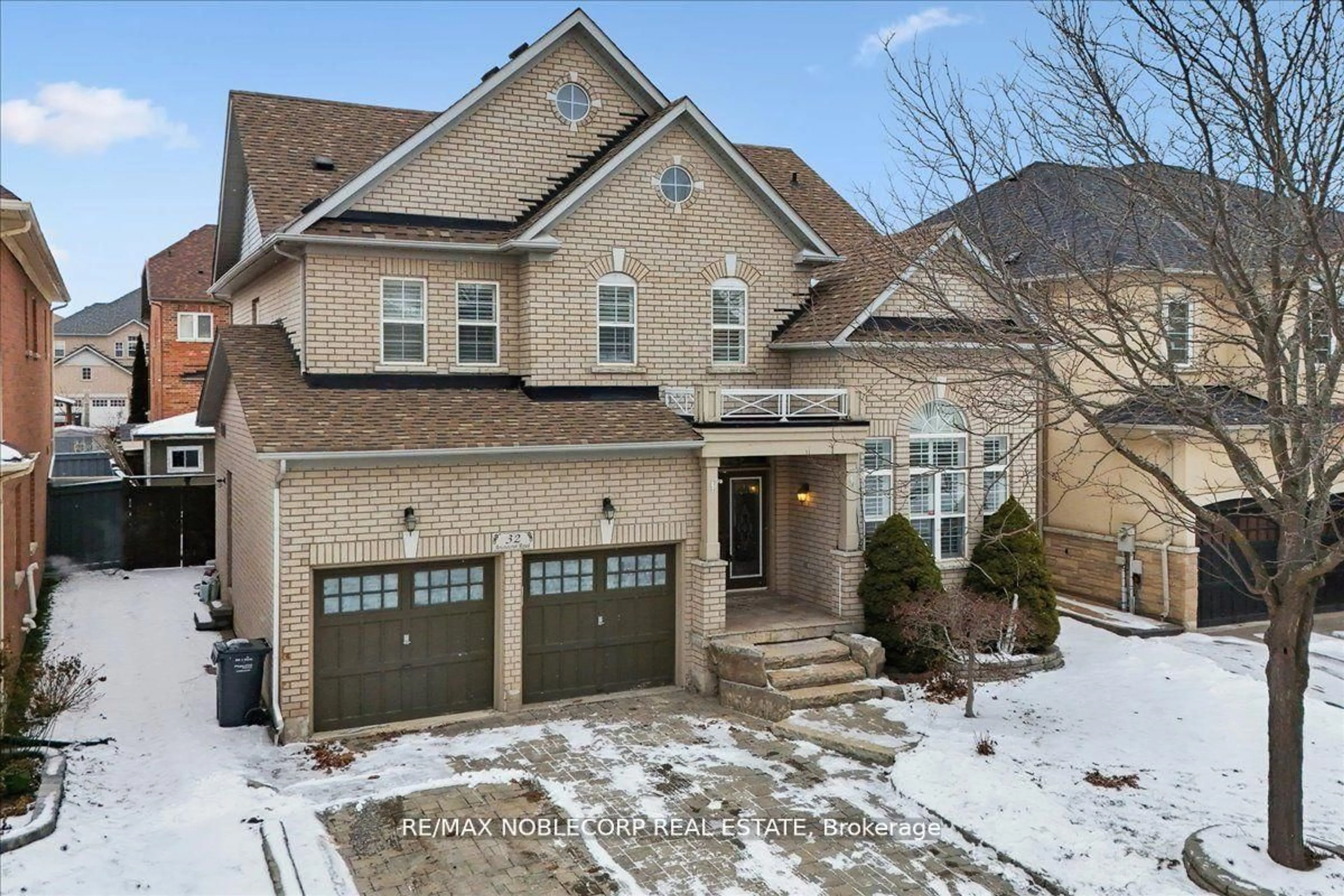 Home with brick exterior material, street for 32 Aristocrat Rd, Brampton Ontario L6P 1X7