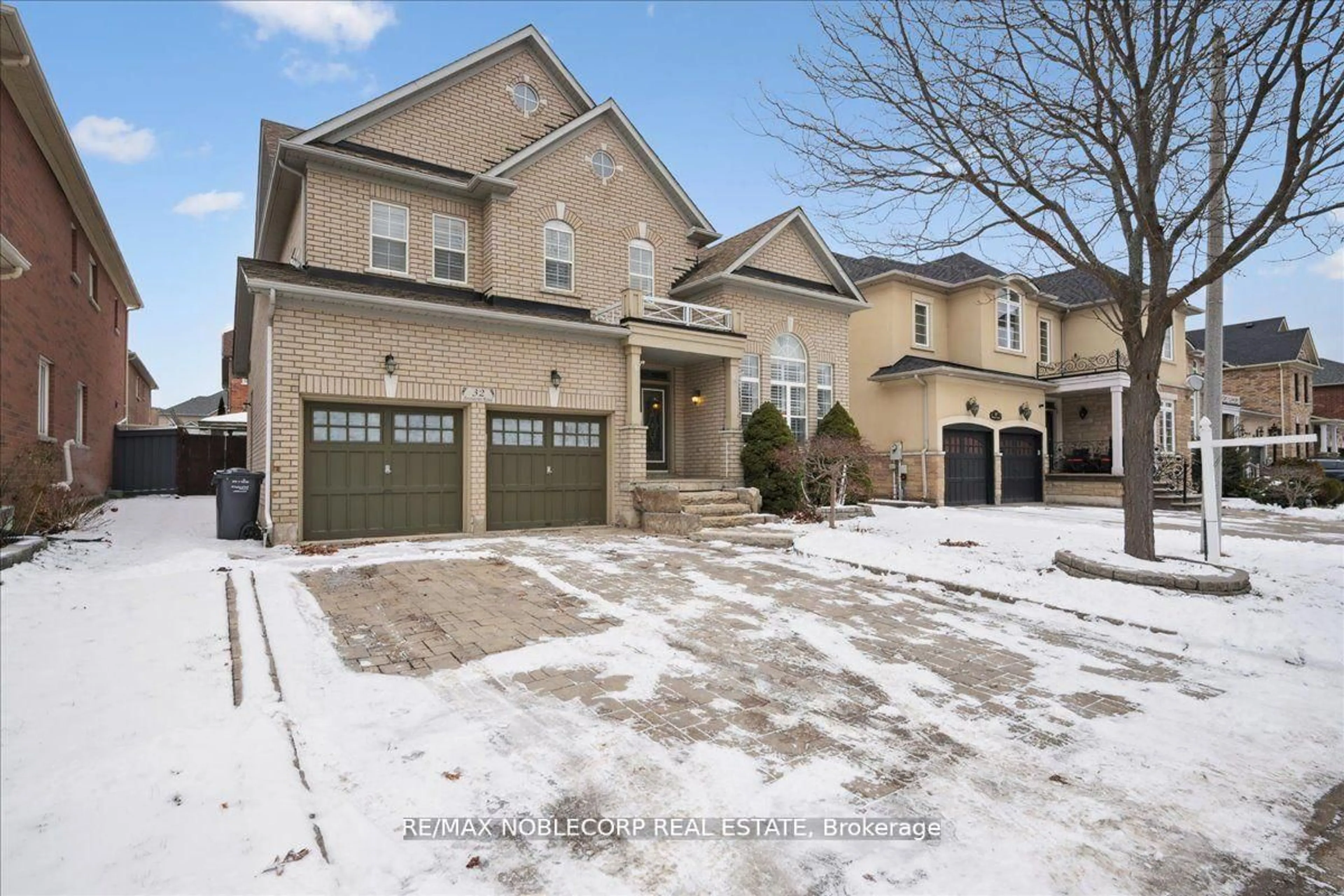 Home with brick exterior material, street for 32 Aristocrat Rd, Brampton Ontario L6P 1X7