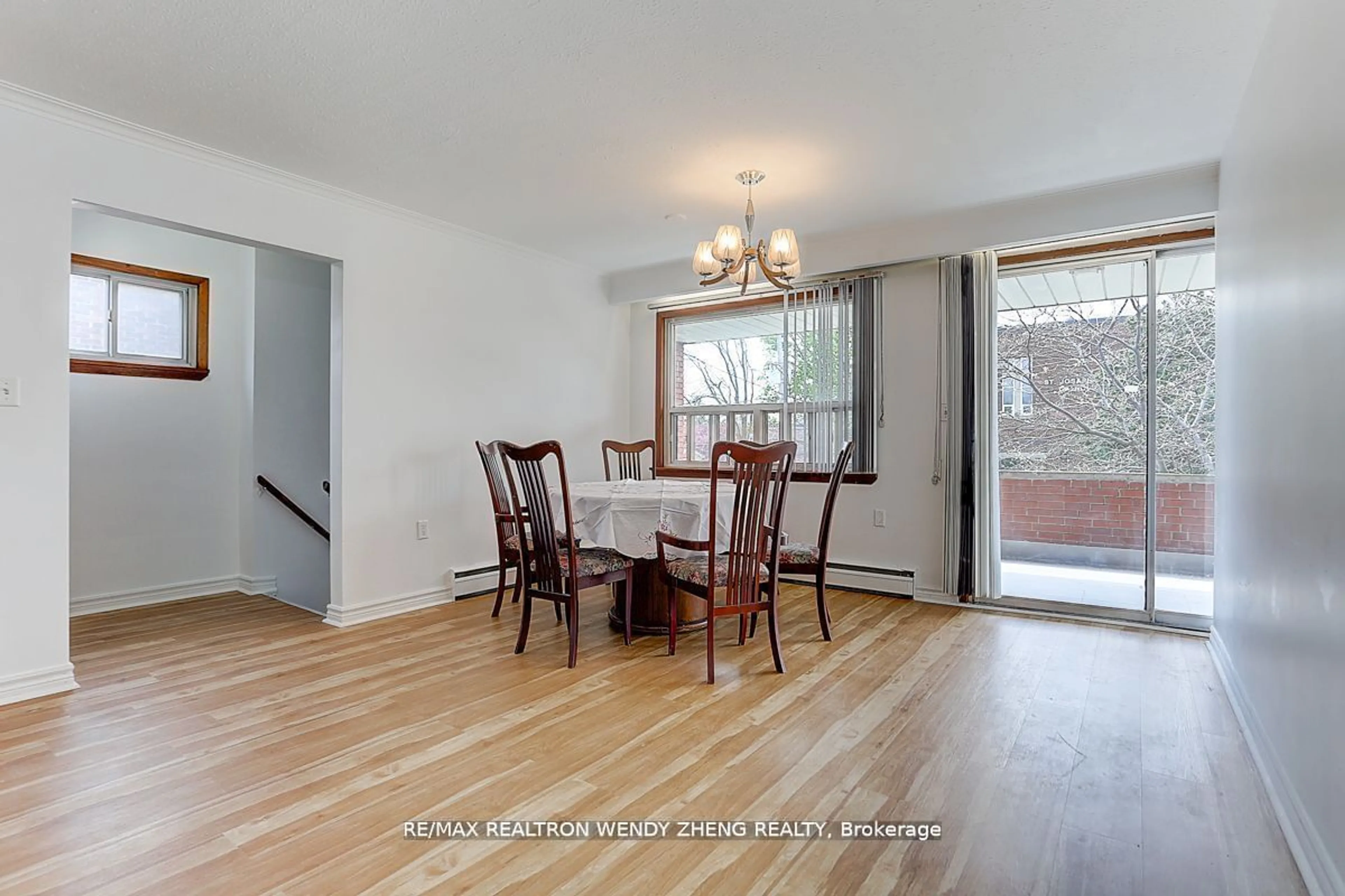 Dining room, wood/laminate floor for 115 Tenth St, Toronto Ontario M8V 3E9