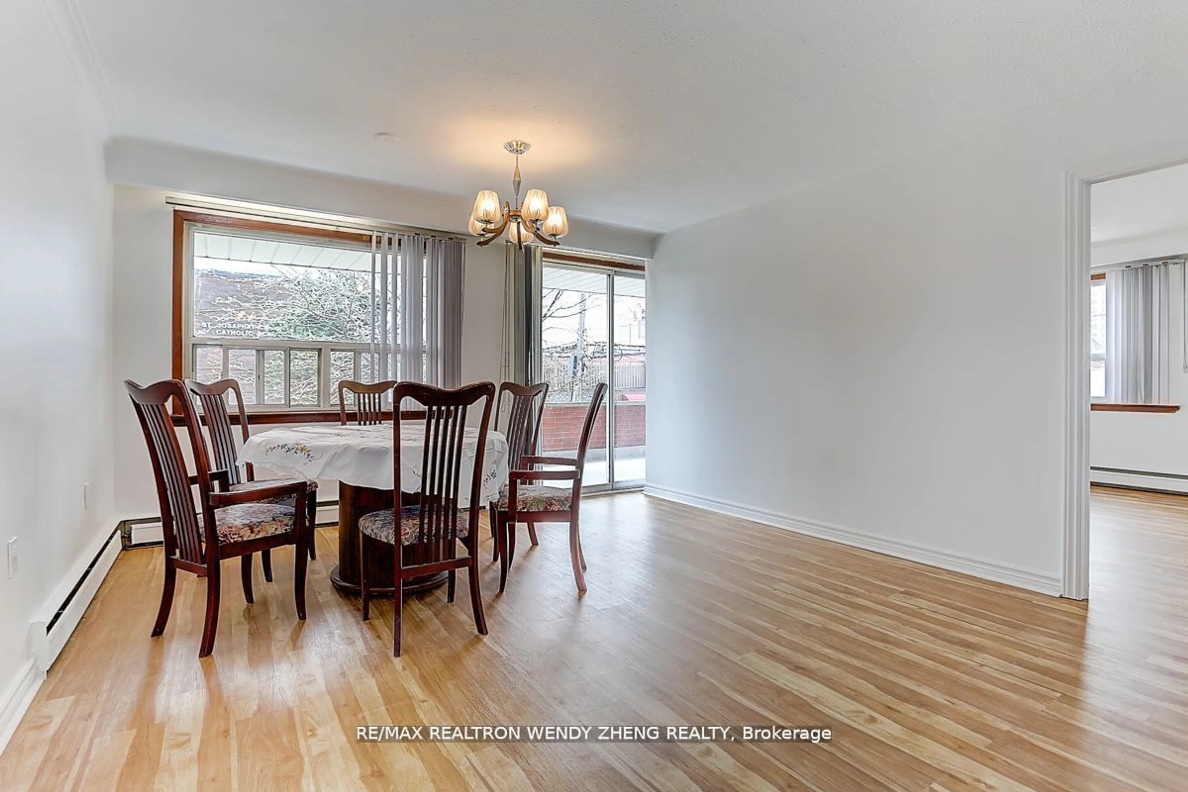 Dining room, wood/laminate floor for 115 Tenth St, Toronto Ontario M8V 3E9