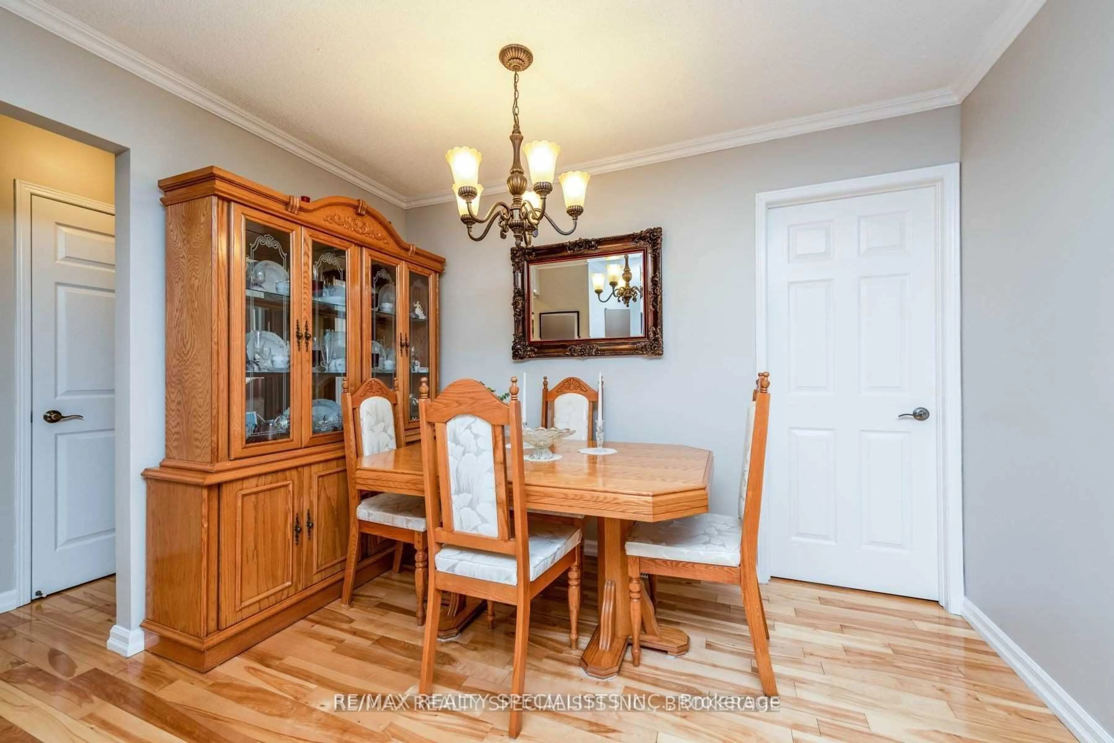 Dining room, wood/laminate floor for 14 Arjay Tr, Brampton Ontario L6X 4L9