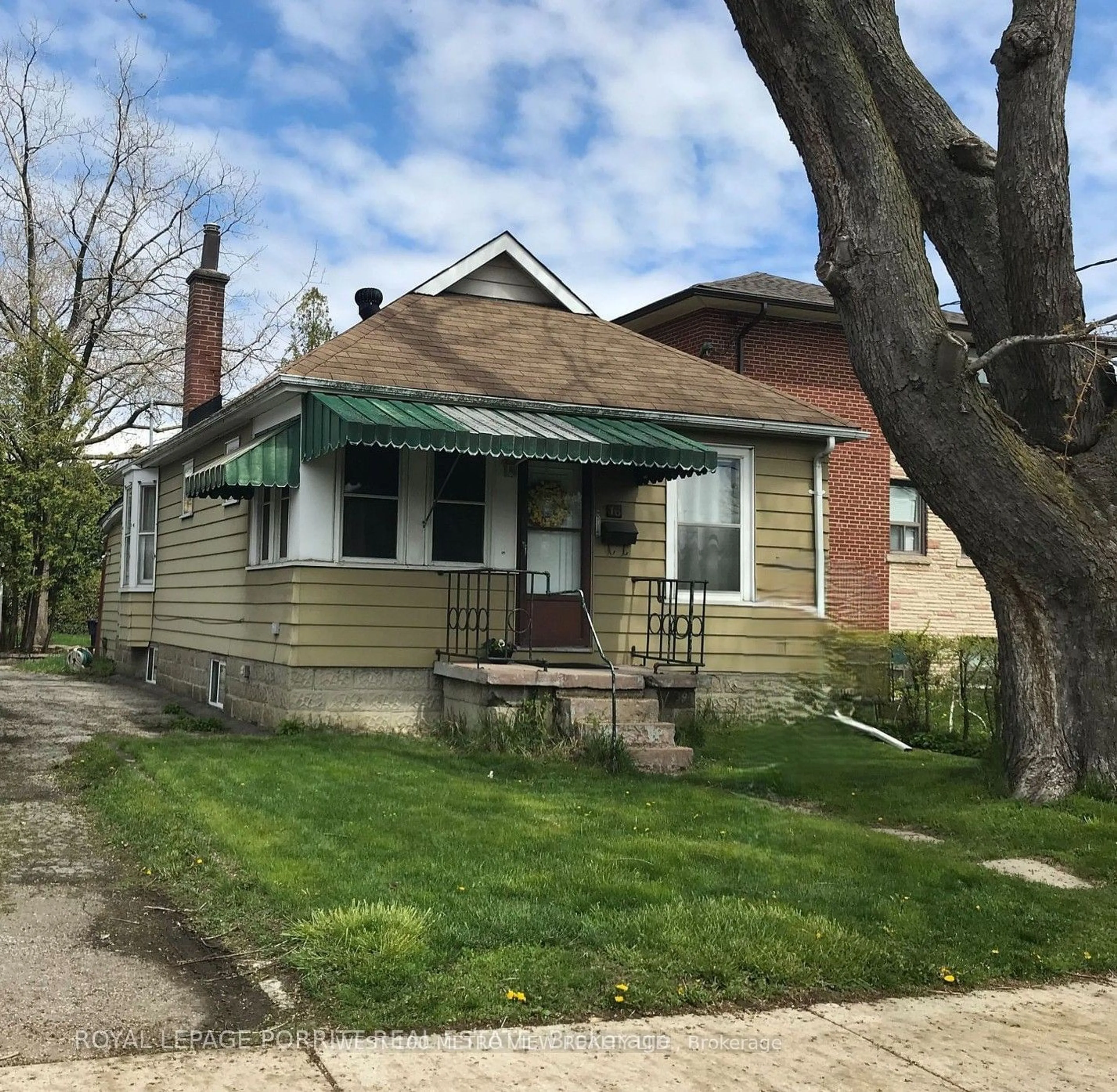 Home with vinyl exterior material, street for 16 Vanevery St, Toronto Ontario M8V 1Y6