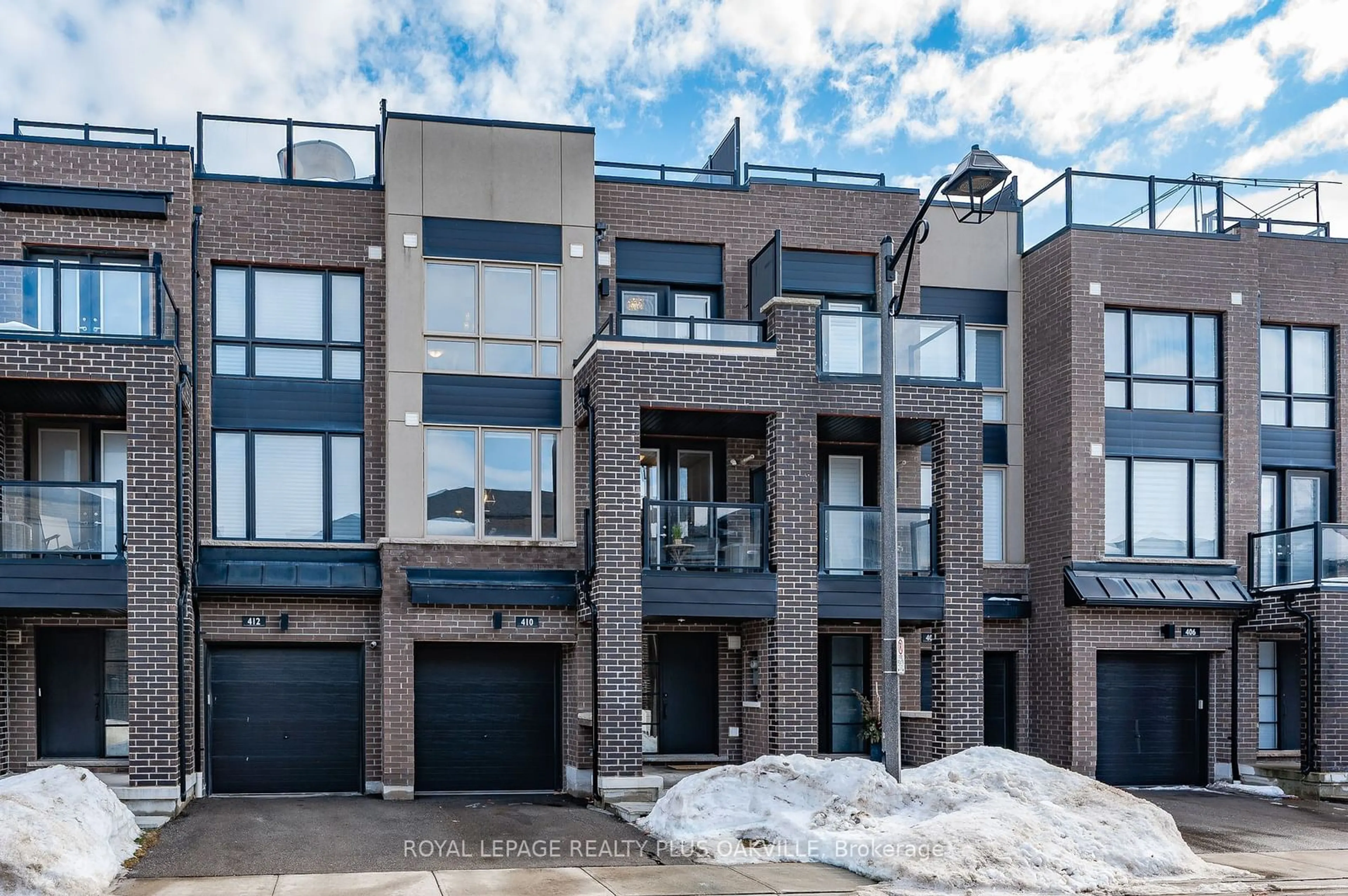 Home with brick exterior material, street for 410 Athabasca Common, Oakville Ontario L6H 0R6