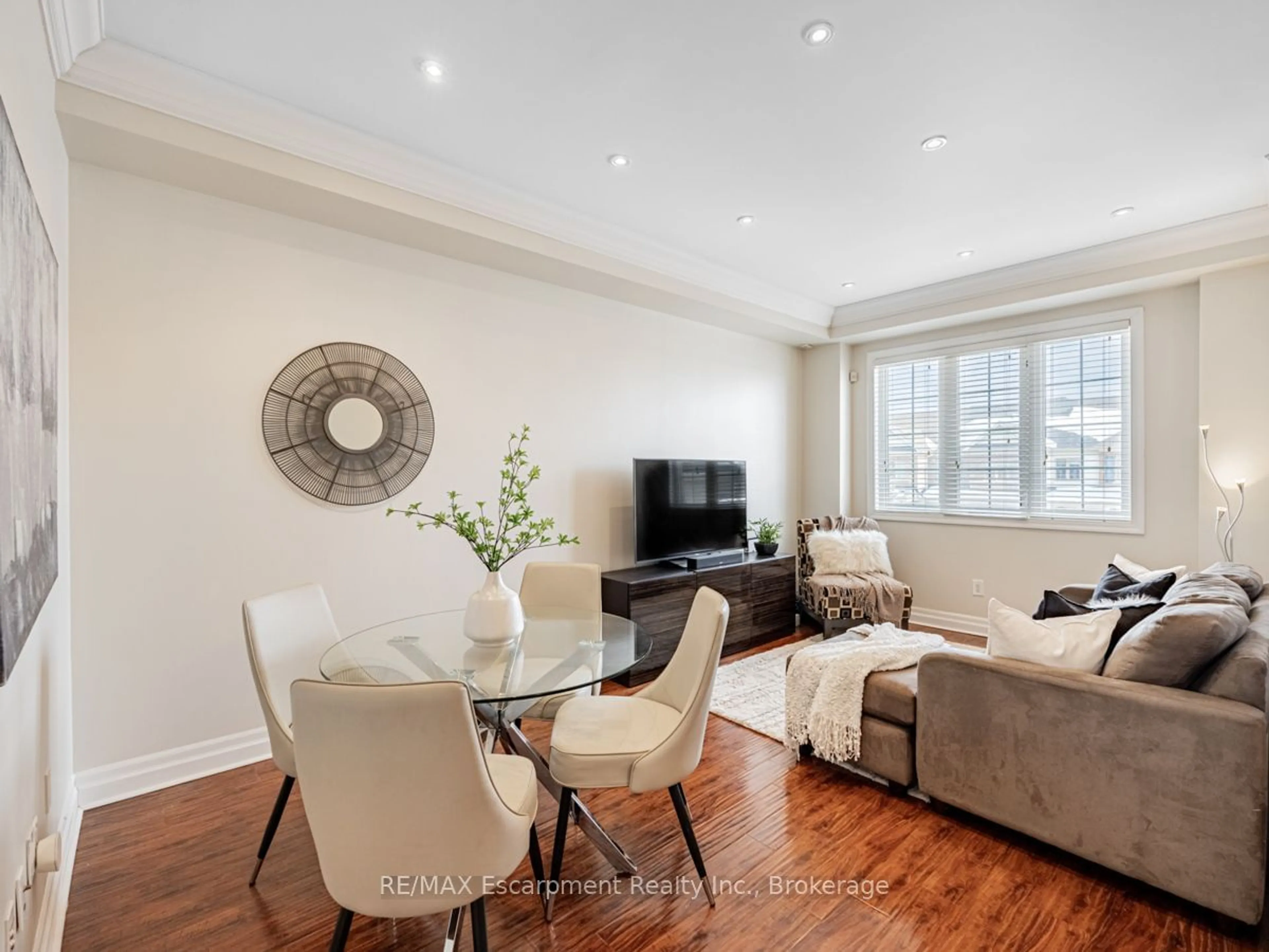 Living room with furniture, wood/laminate floor for 2157 Fiddlers Way, Oakville Ontario L6M 0M5