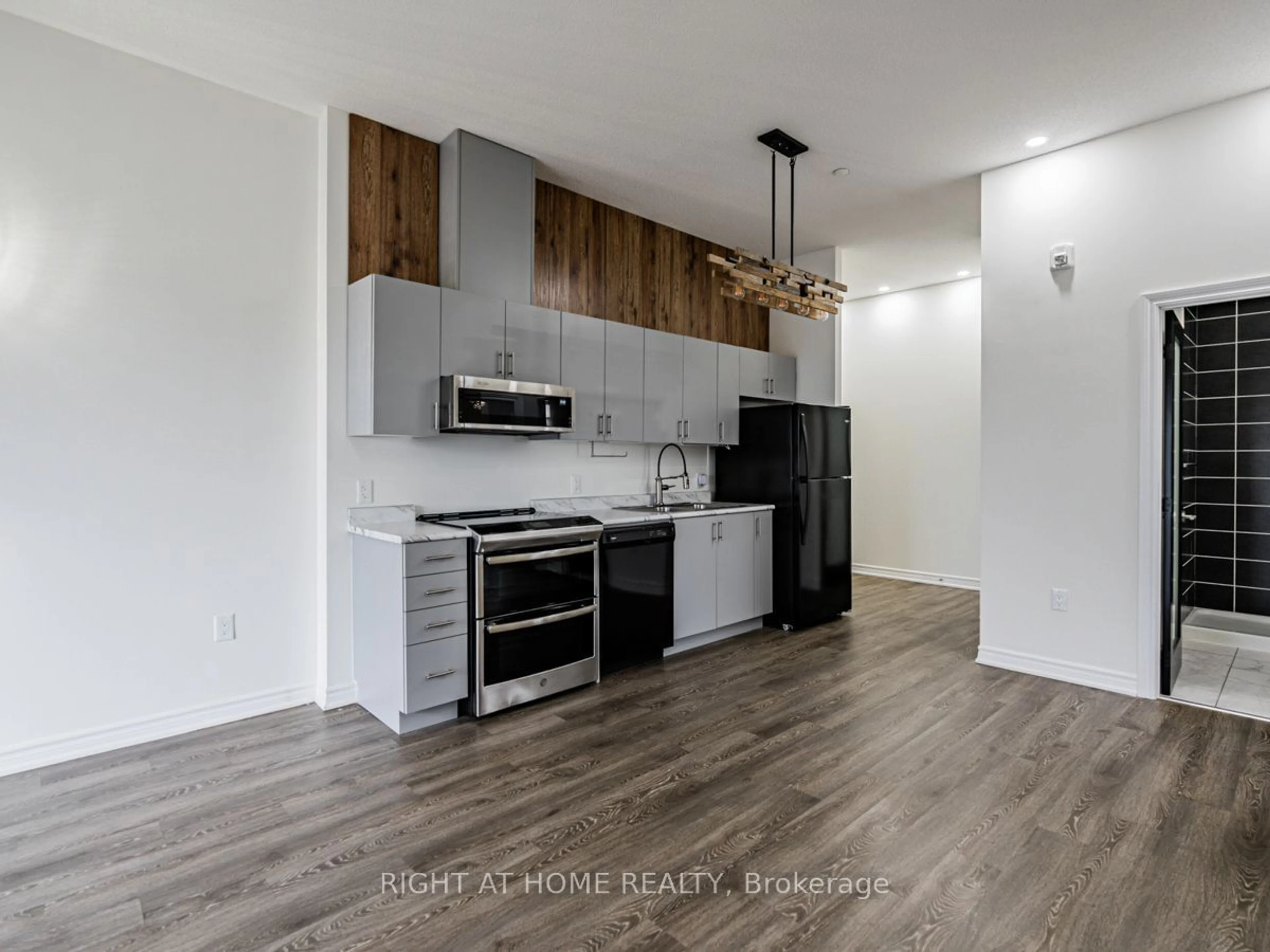 Open concept kitchen, wood/laminate floor for 716 Main St #1108, Milton Ontario L0P 1B0