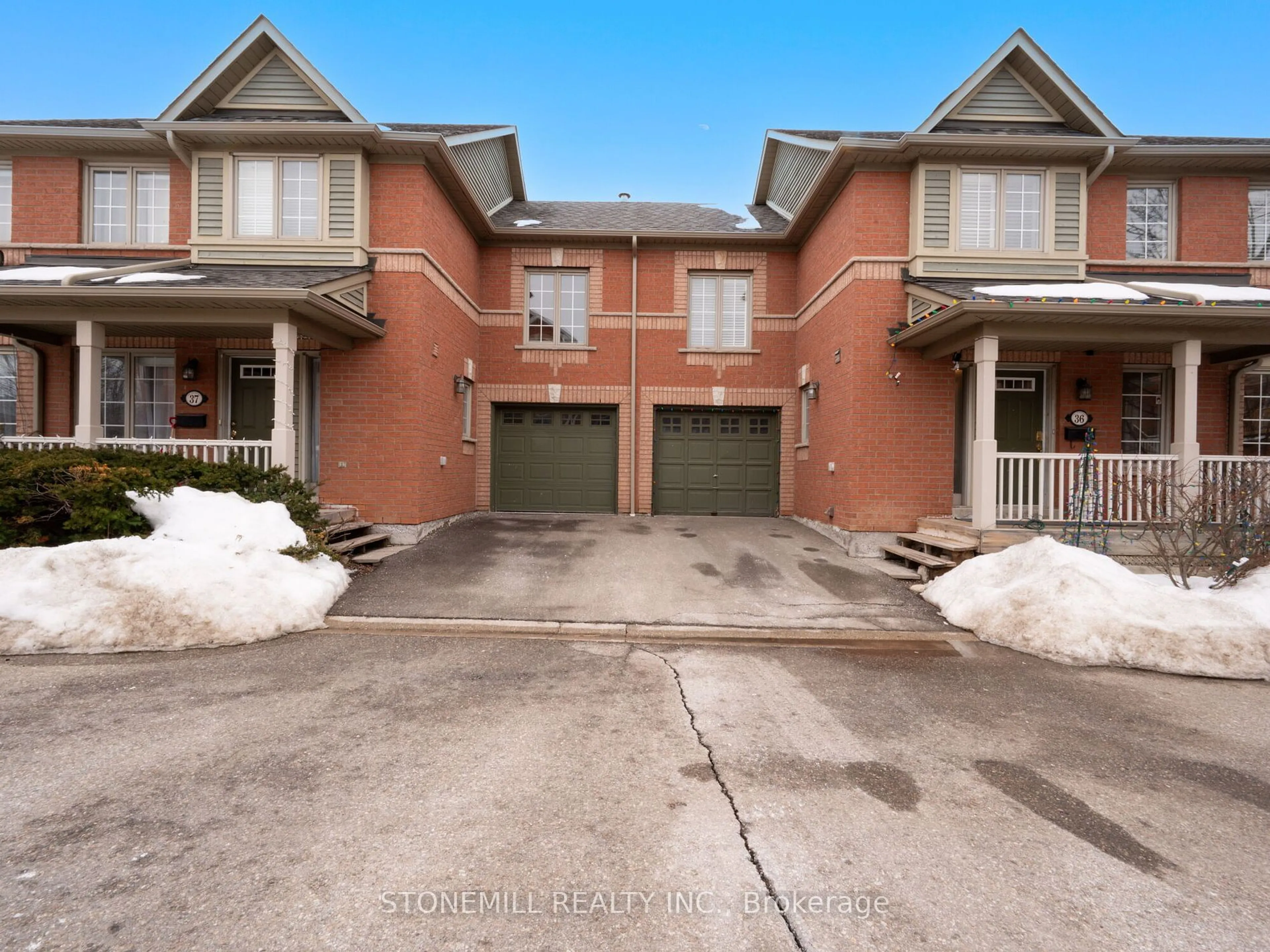 Home with brick exterior material, street for 5031 East Mill Rd #36, Mississauga Ontario L5V 2M5