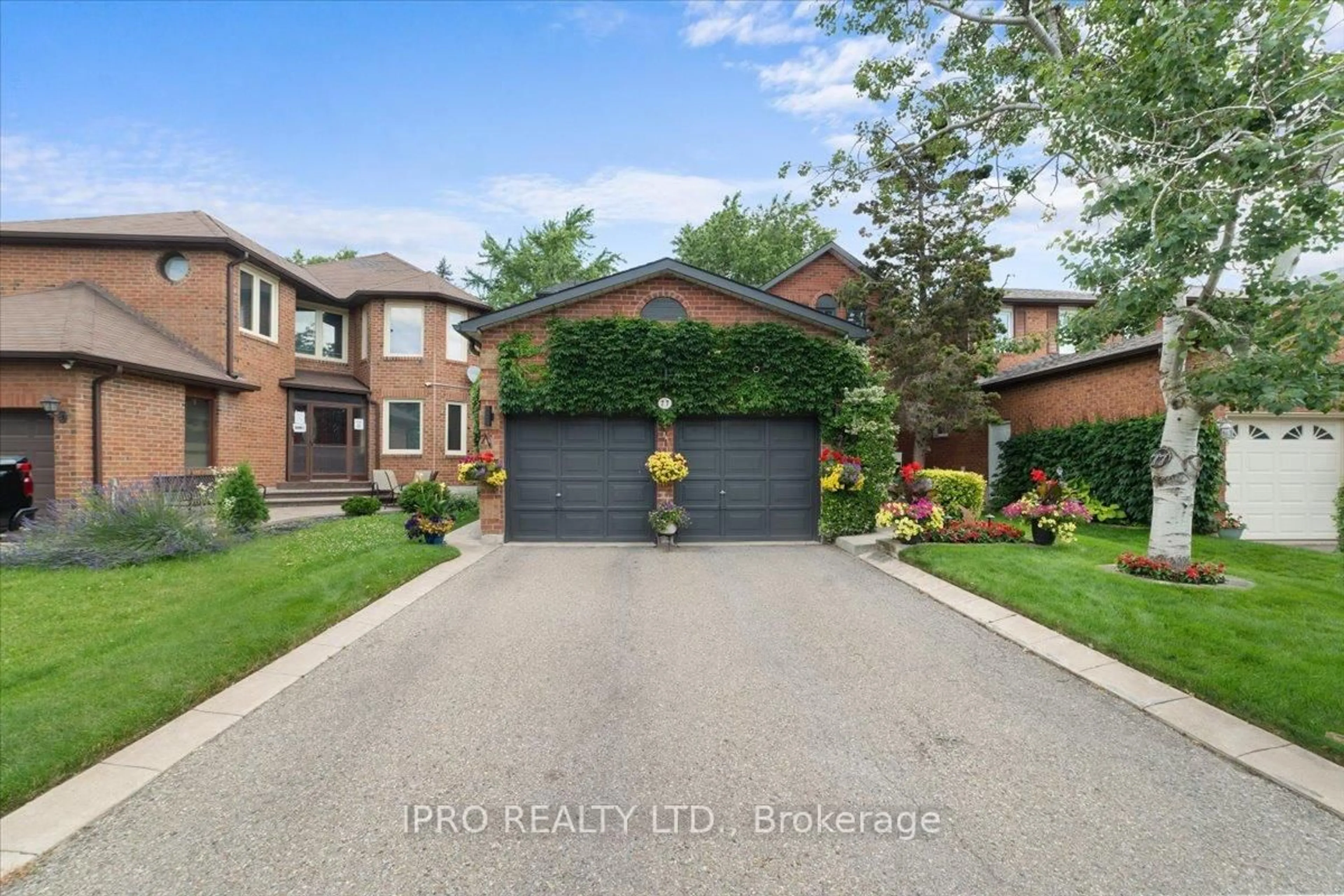 Home with brick exterior material, street for 77 Lord Simcoe Dr, Brampton Ontario L6S 5H1